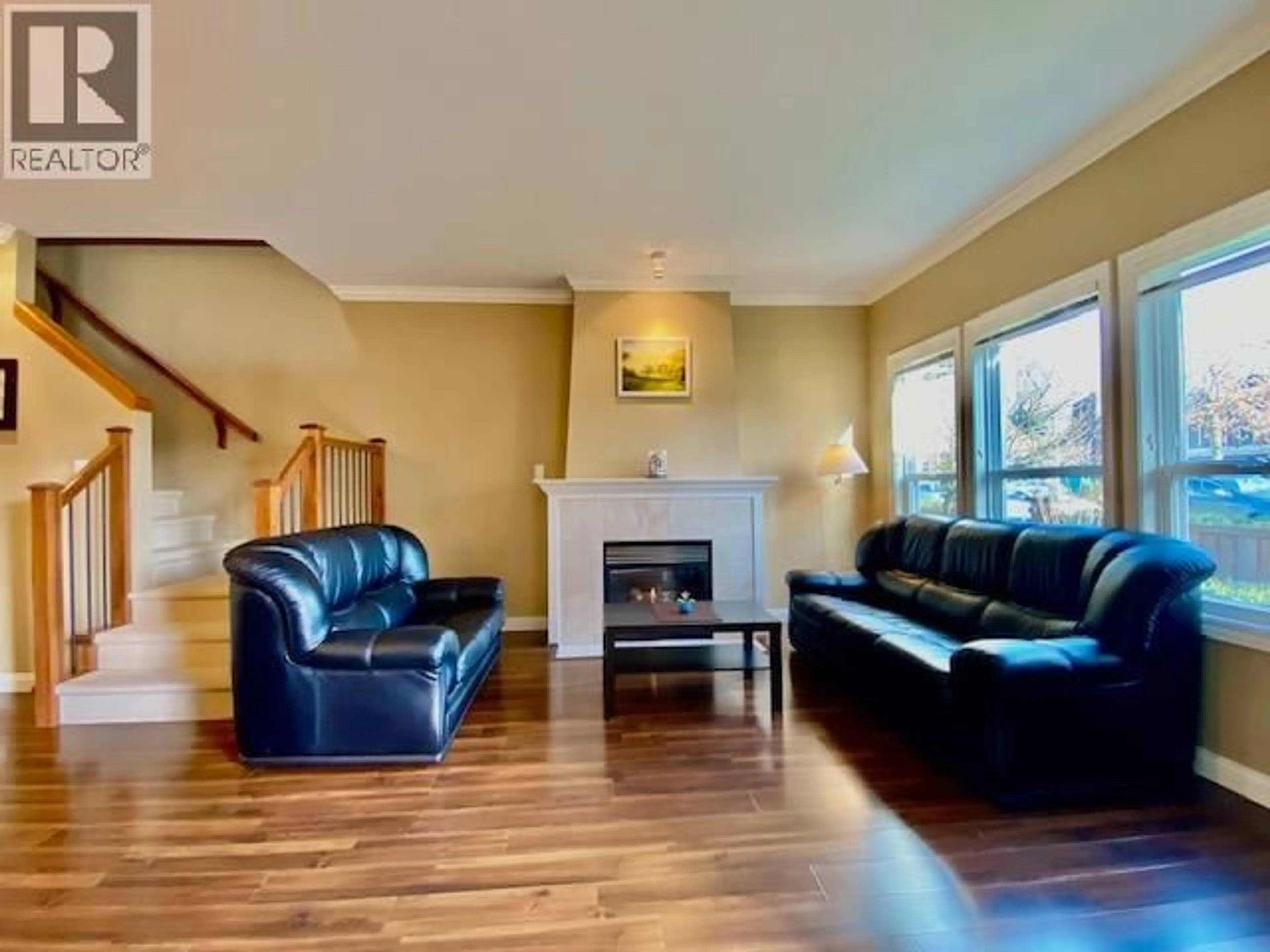 Living room with furniture, wood/laminate floor for 4 - 6733 LIVINGSTONE PLACE, Richmond British Columbia V7C5V8