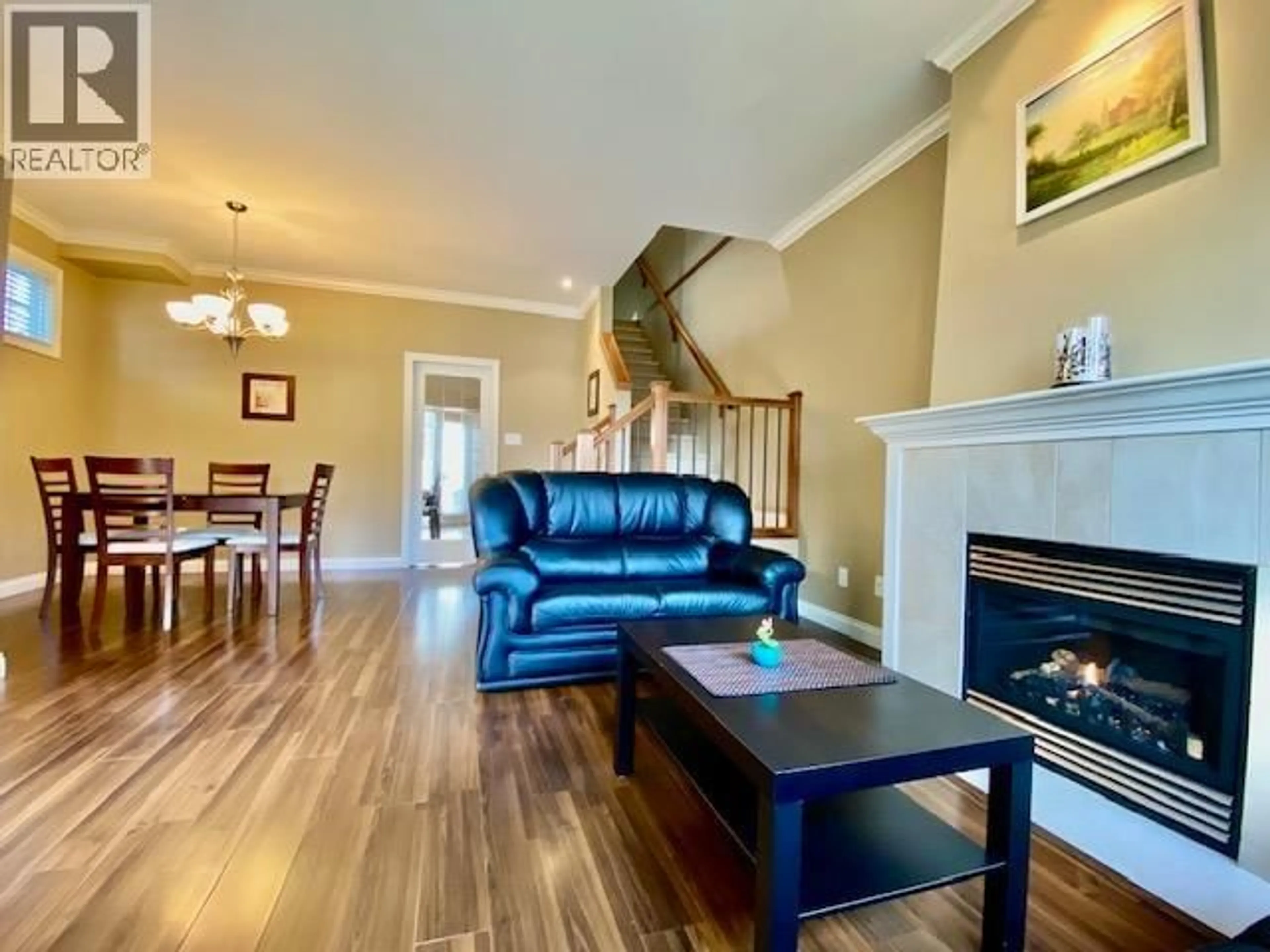 Living room with furniture, wood/laminate floor for 4 - 6733 LIVINGSTONE PLACE, Richmond British Columbia V7C5V8