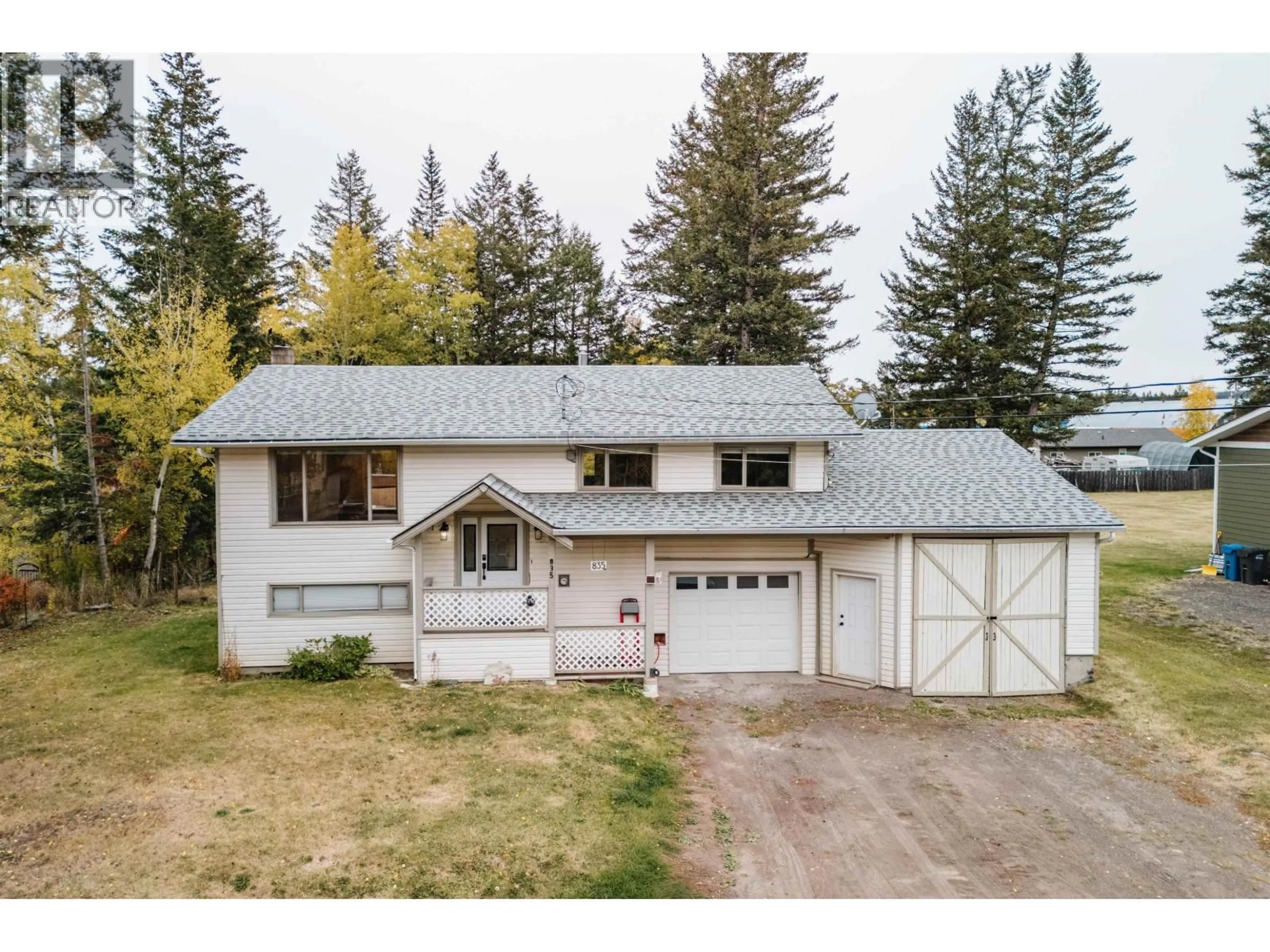 A pic from outside/outdoor area/front of a property/back of a property/a pic from drone, street for 835 SPRUCE AVENUE, 100 Mile House British Columbia V0K2E0