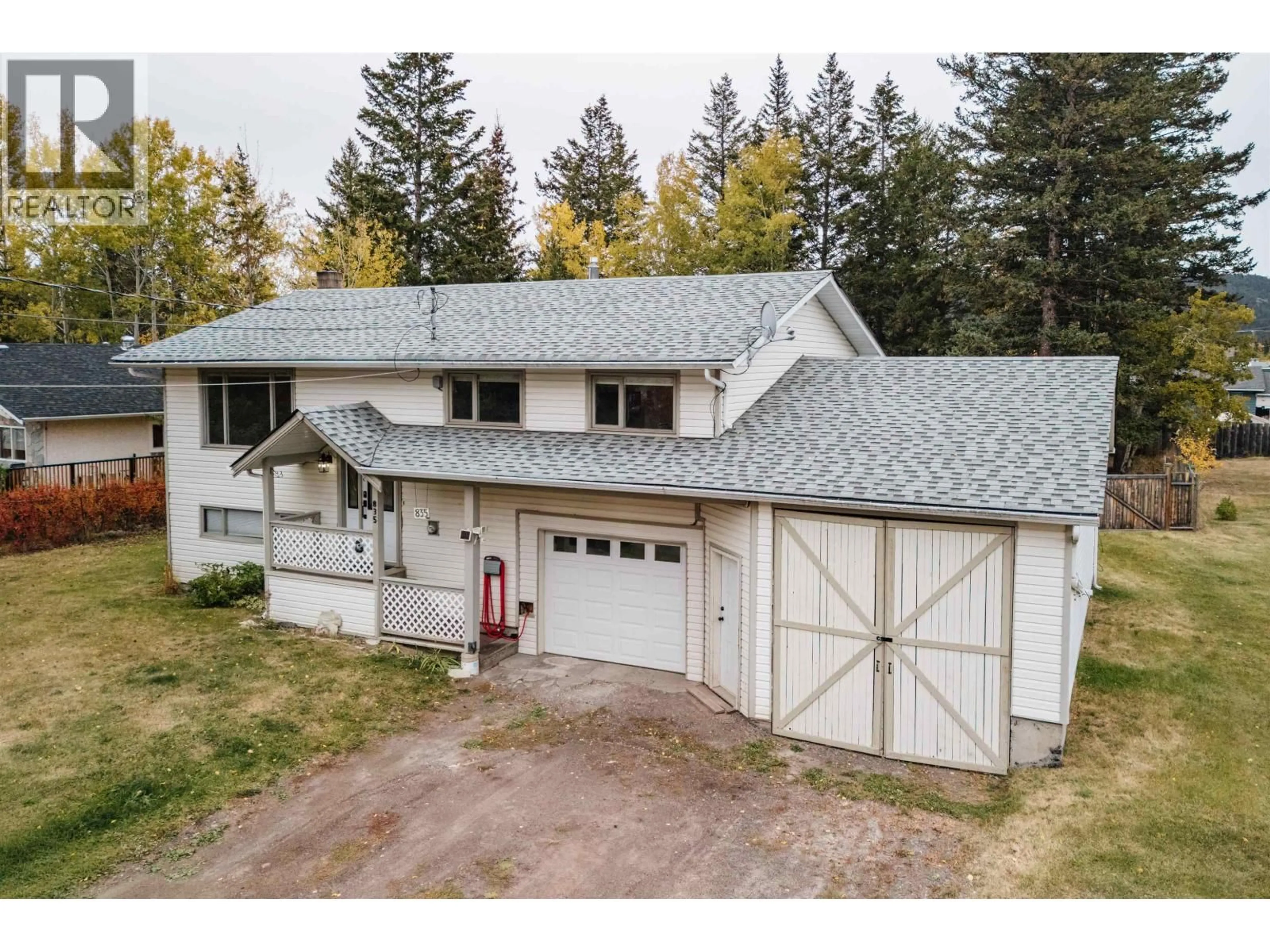 A pic from outside/outdoor area/front of a property/back of a property/a pic from drone, street for 835 SPRUCE AVENUE, 100 Mile House British Columbia V0K2E0