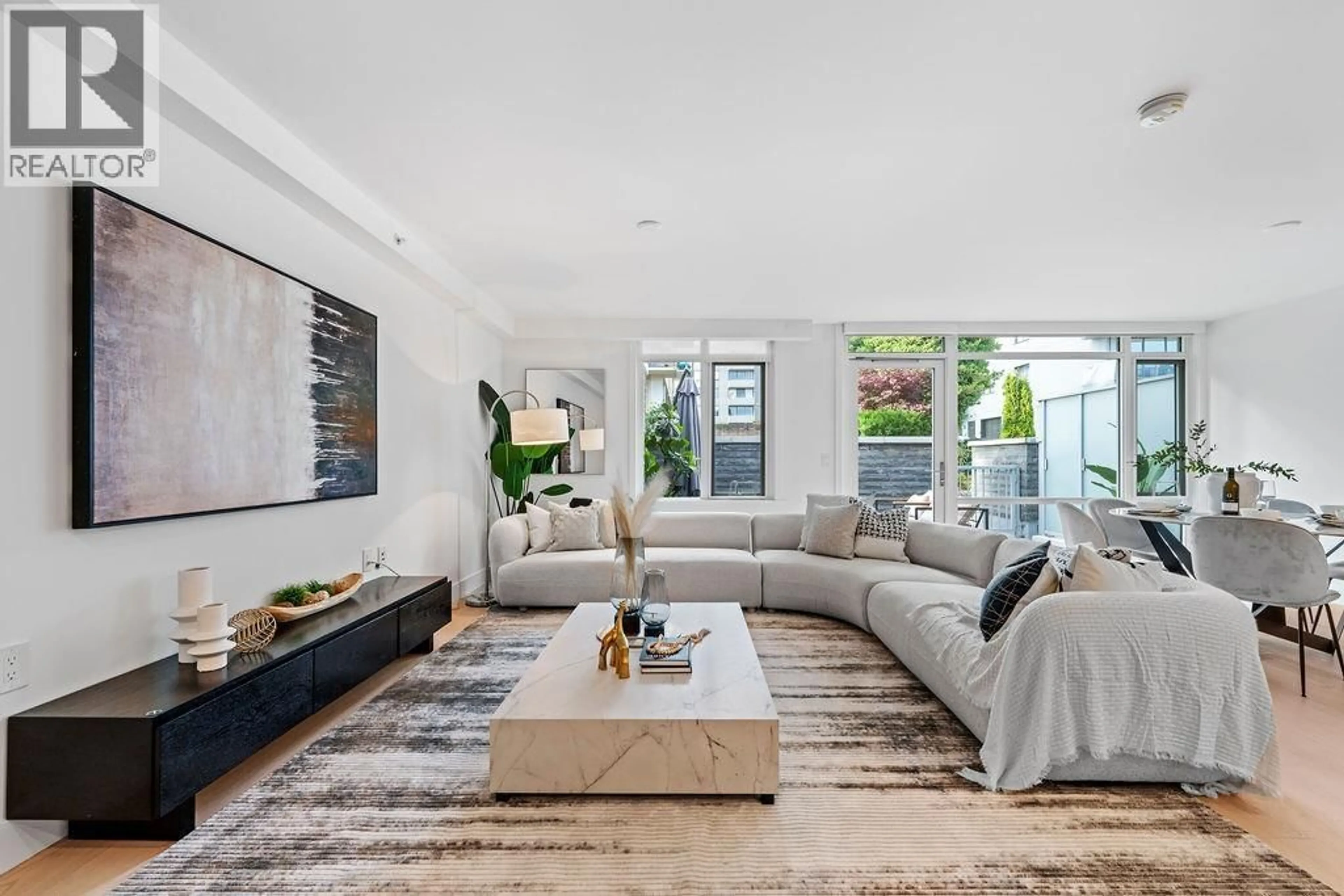 Living room with furniture, unknown for 202 - 1331 MARINE DRIVE, West Vancouver British Columbia V7T1B6