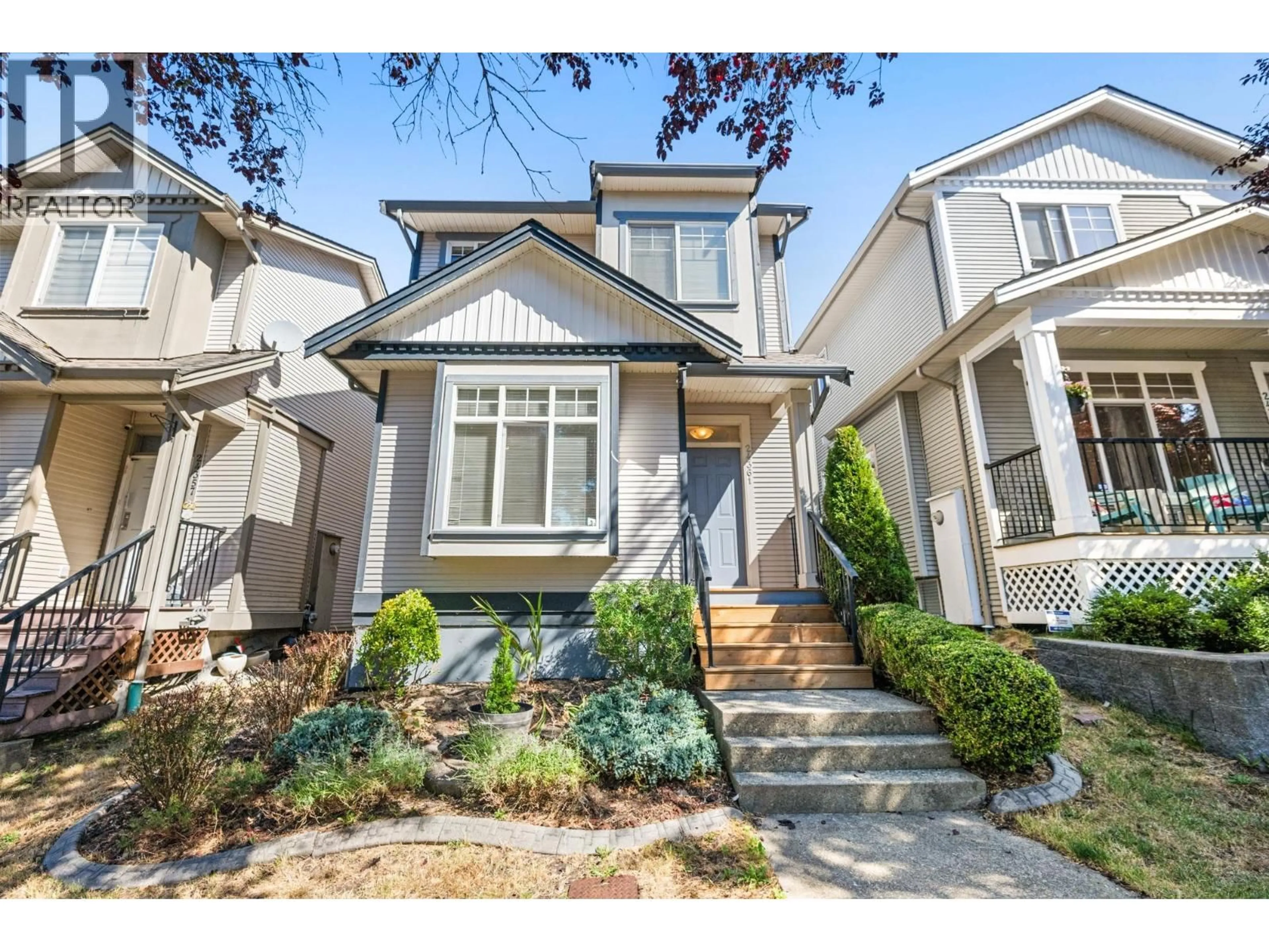 Home with vinyl exterior material, street for 24361 102A AVENUE, Maple Ridge British Columbia V2W2E3