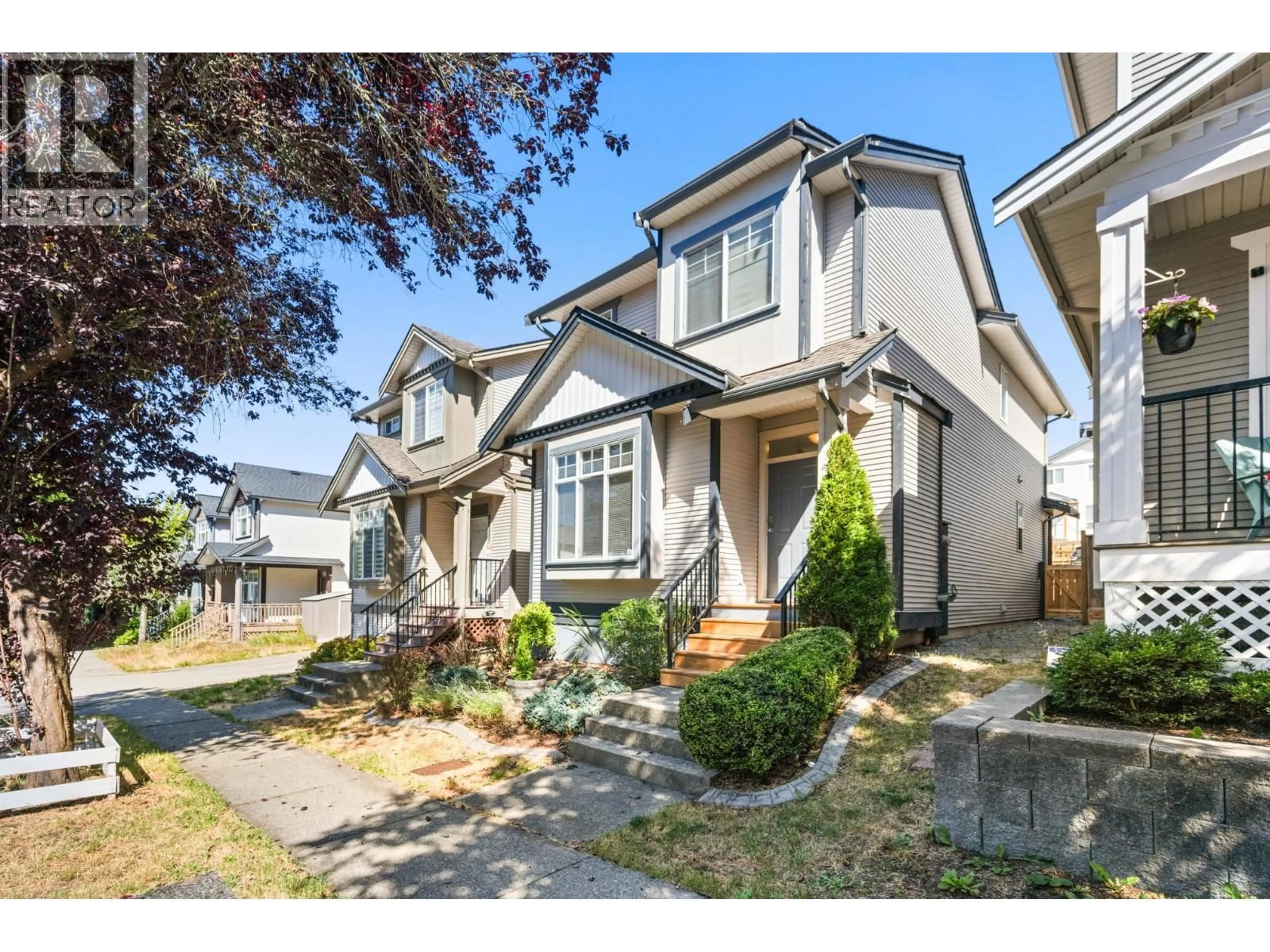 Home with vinyl exterior material, street for 24361 102A AVENUE, Maple Ridge British Columbia V2W2E3