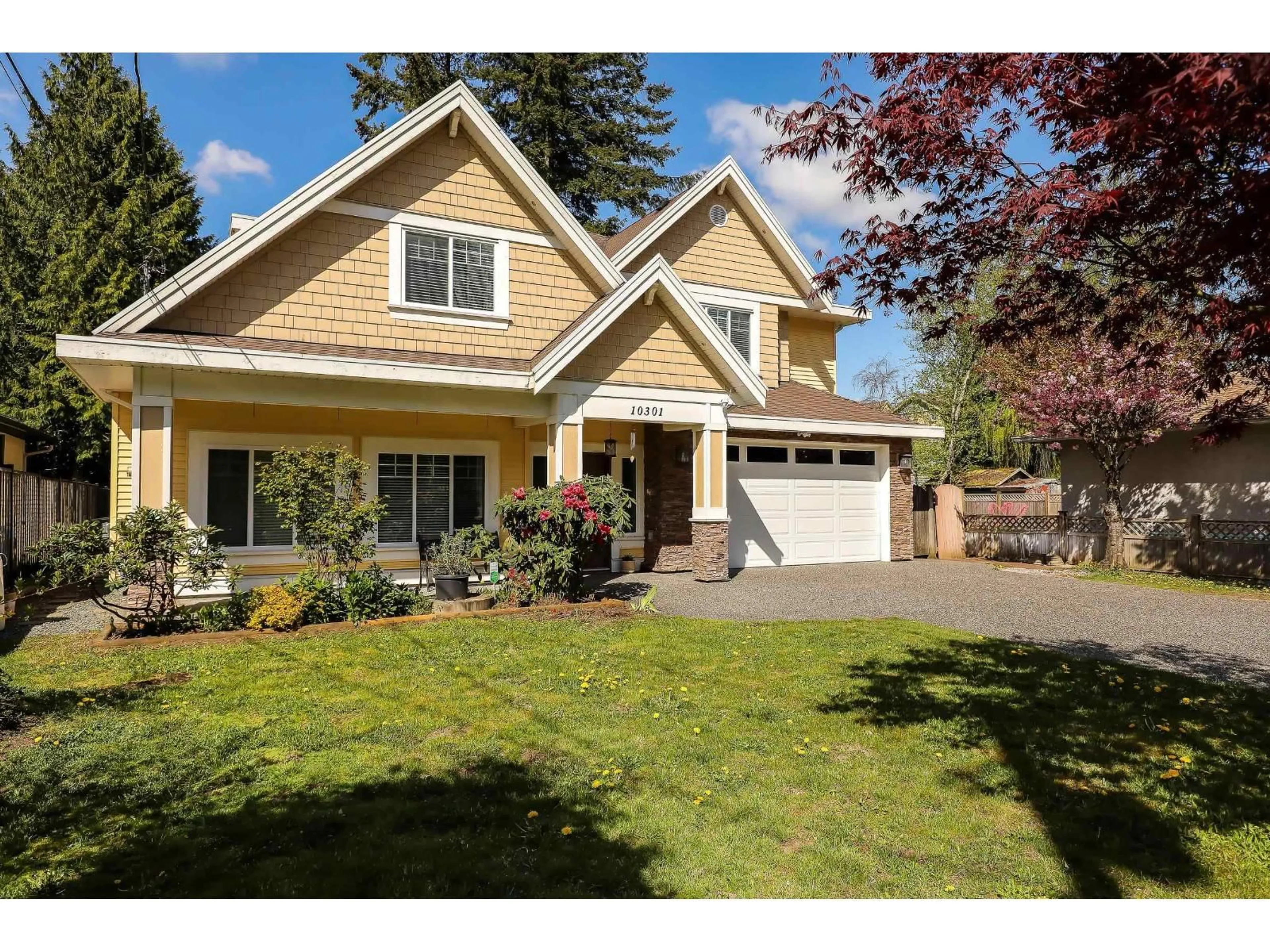 Home with vinyl exterior material, street for 10301 155A, Surrey British Columbia V3R4K4