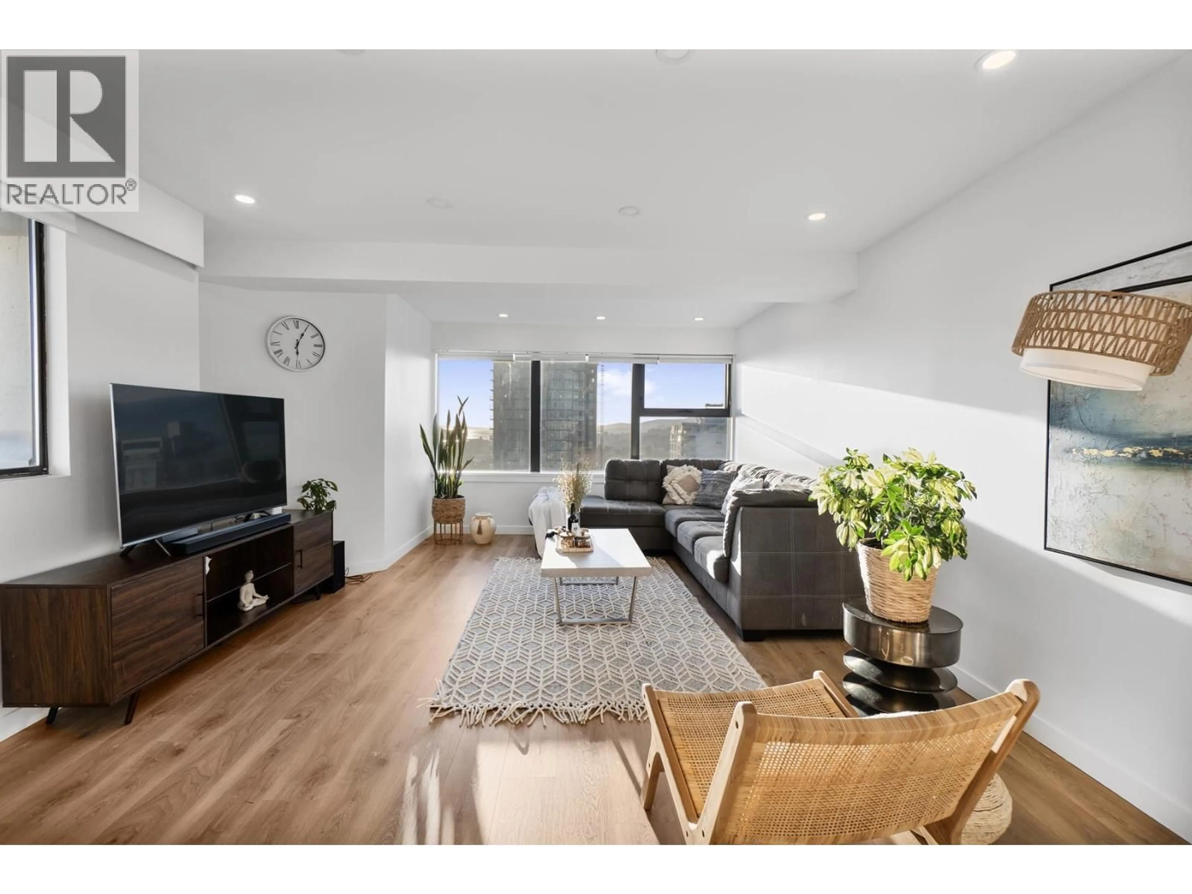 Living room with furniture, wood/laminate floor for 1304 - 1515 EASTERN AVENUE, North Vancouver British Columbia V7L4R2