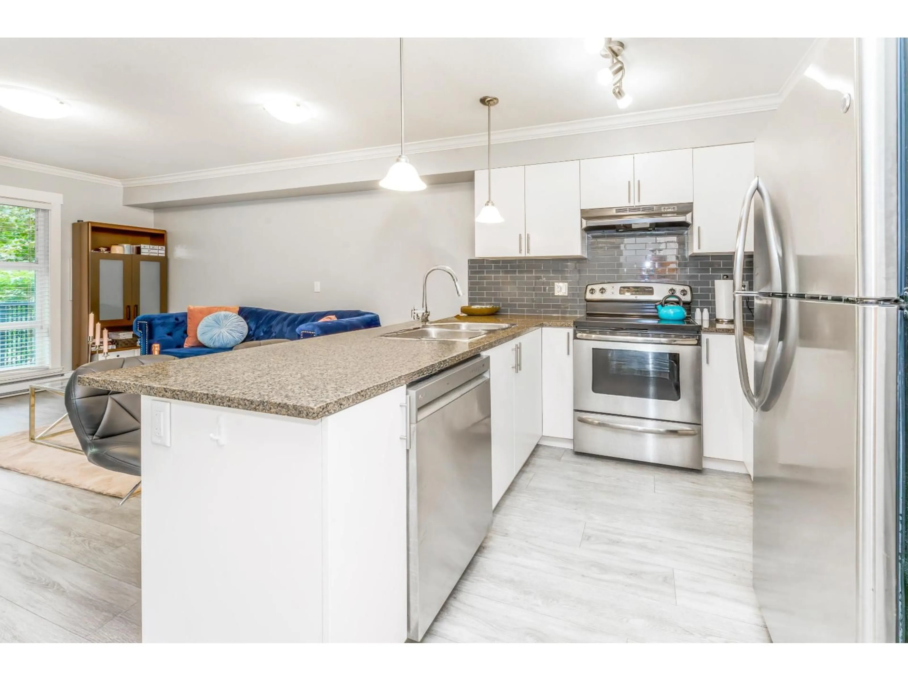 Open concept kitchen, ceramic/tile floor for 217 - 17769 57, Surrey British Columbia V3S1H1