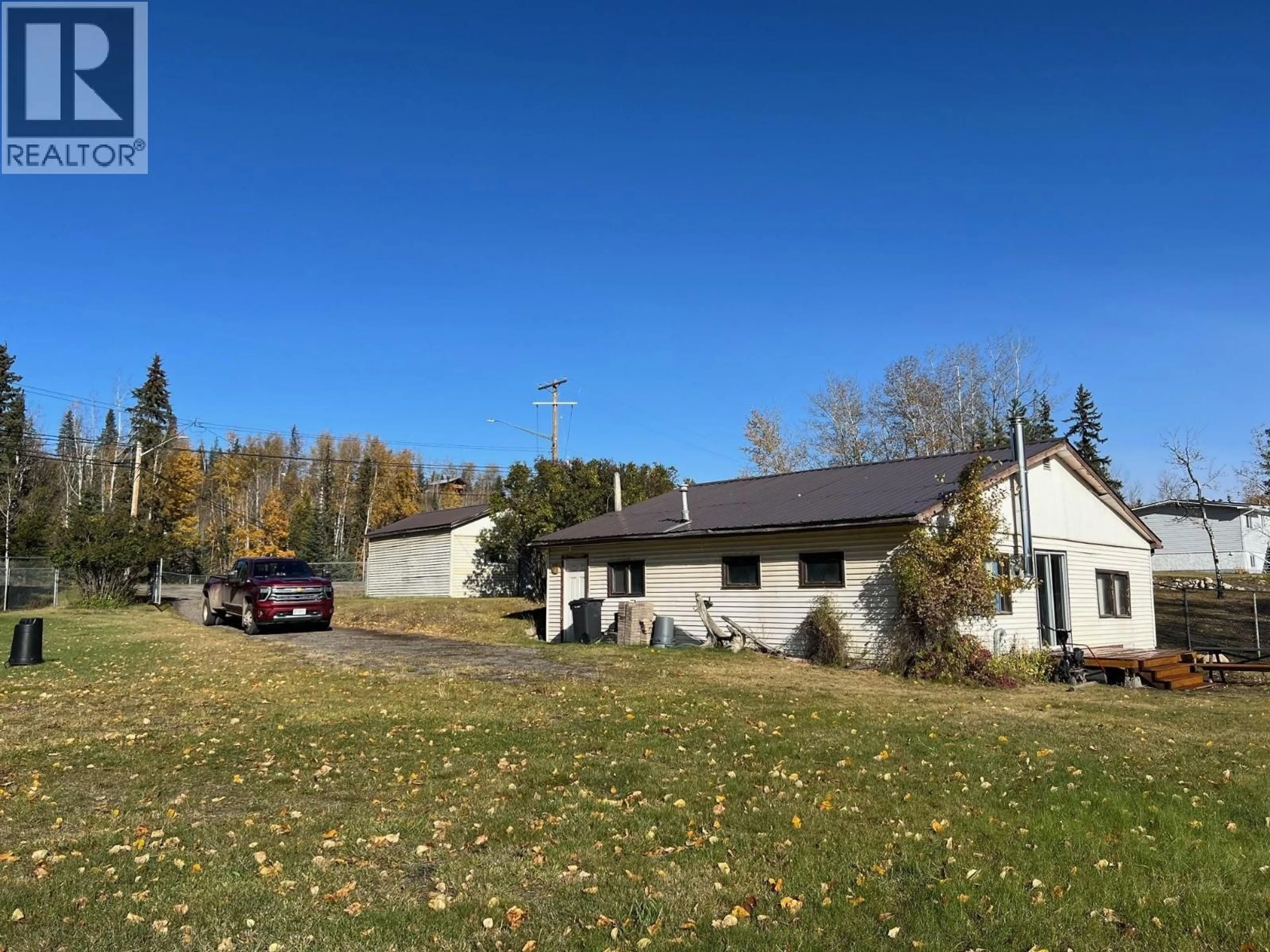 A pic from outside/outdoor area/front of a property/back of a property/a pic from drone, mountain view for 9201 CANYON DRIVE, Hudsons Hope British Columbia V0C1V0
