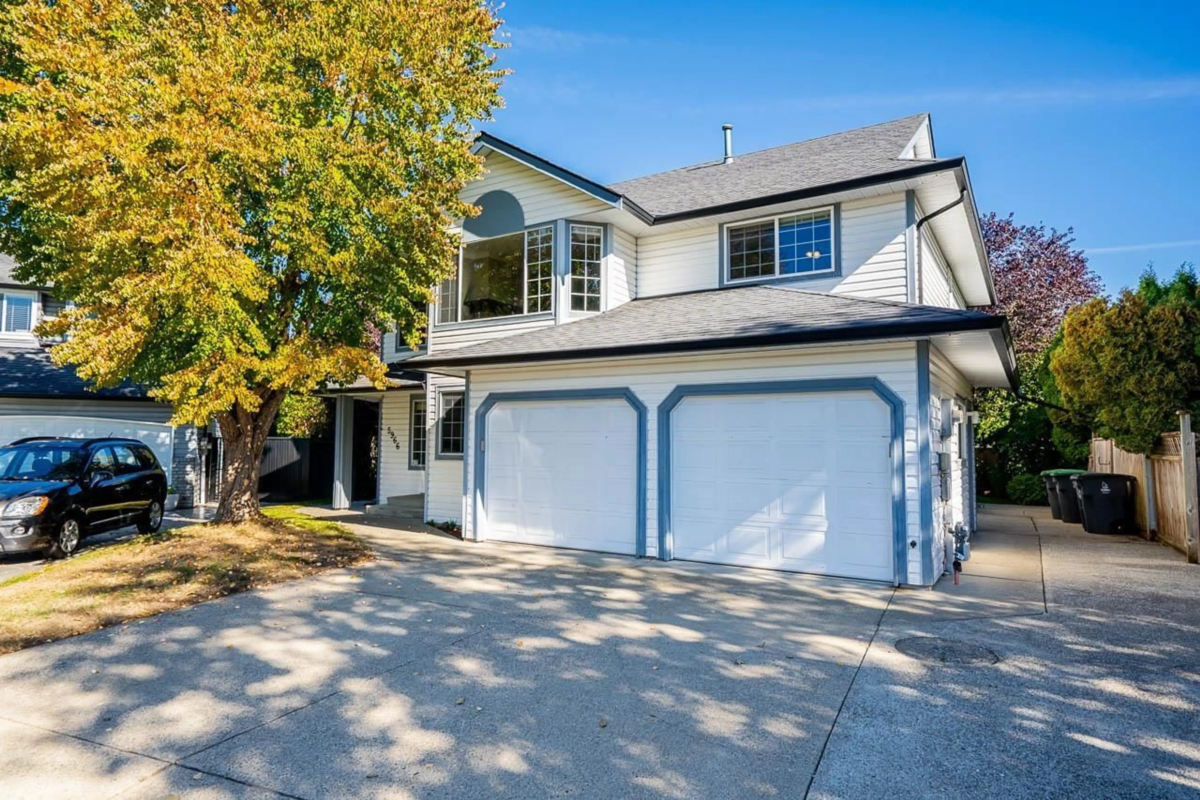 Home with vinyl exterior material, street for 5966 186, Surrey British Columbia V3S7Z8