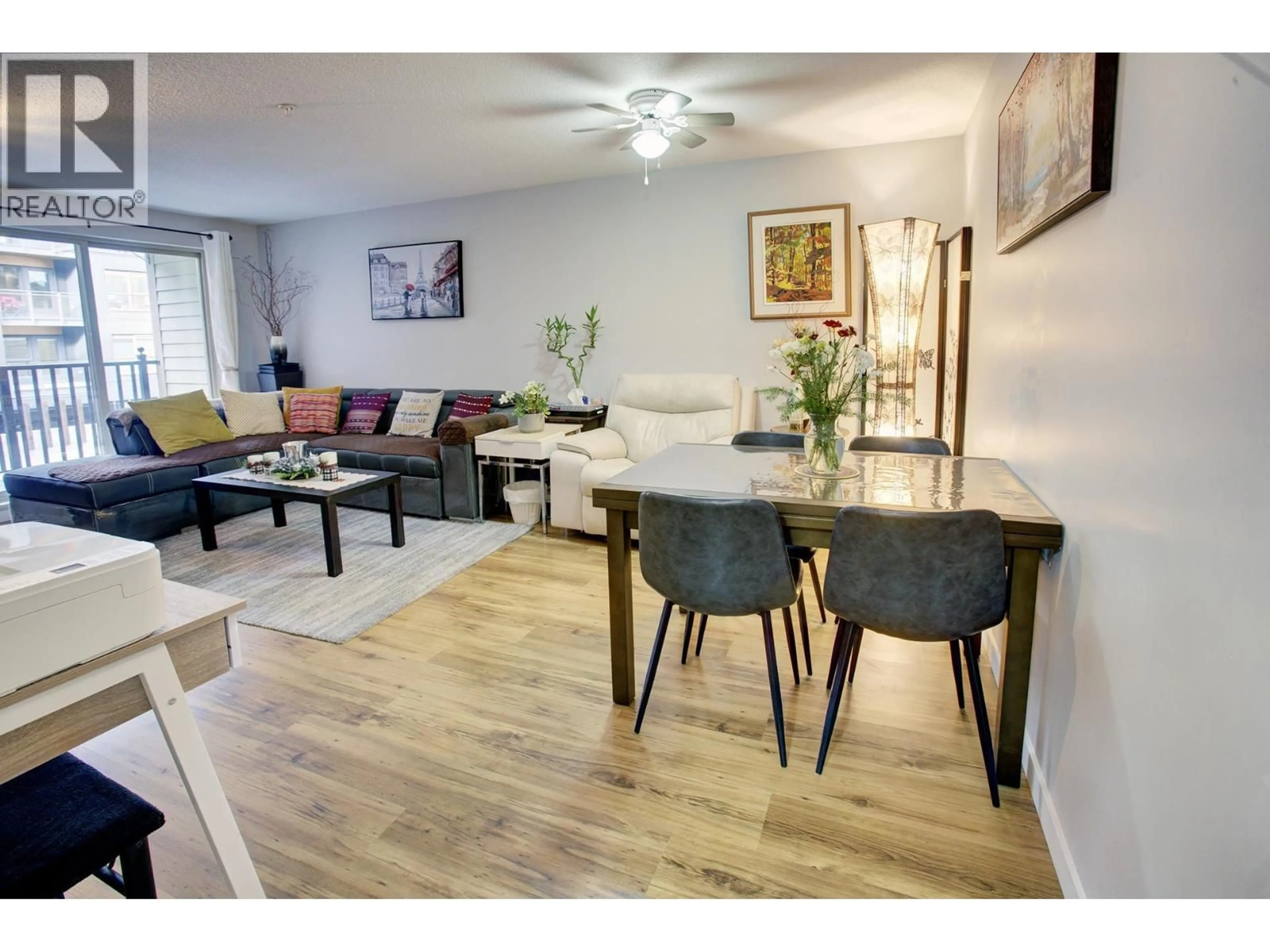 Living room with furniture, wood/laminate floor for 207 - 38003 SECOND AVENUE, Squamish British Columbia V8B0B8