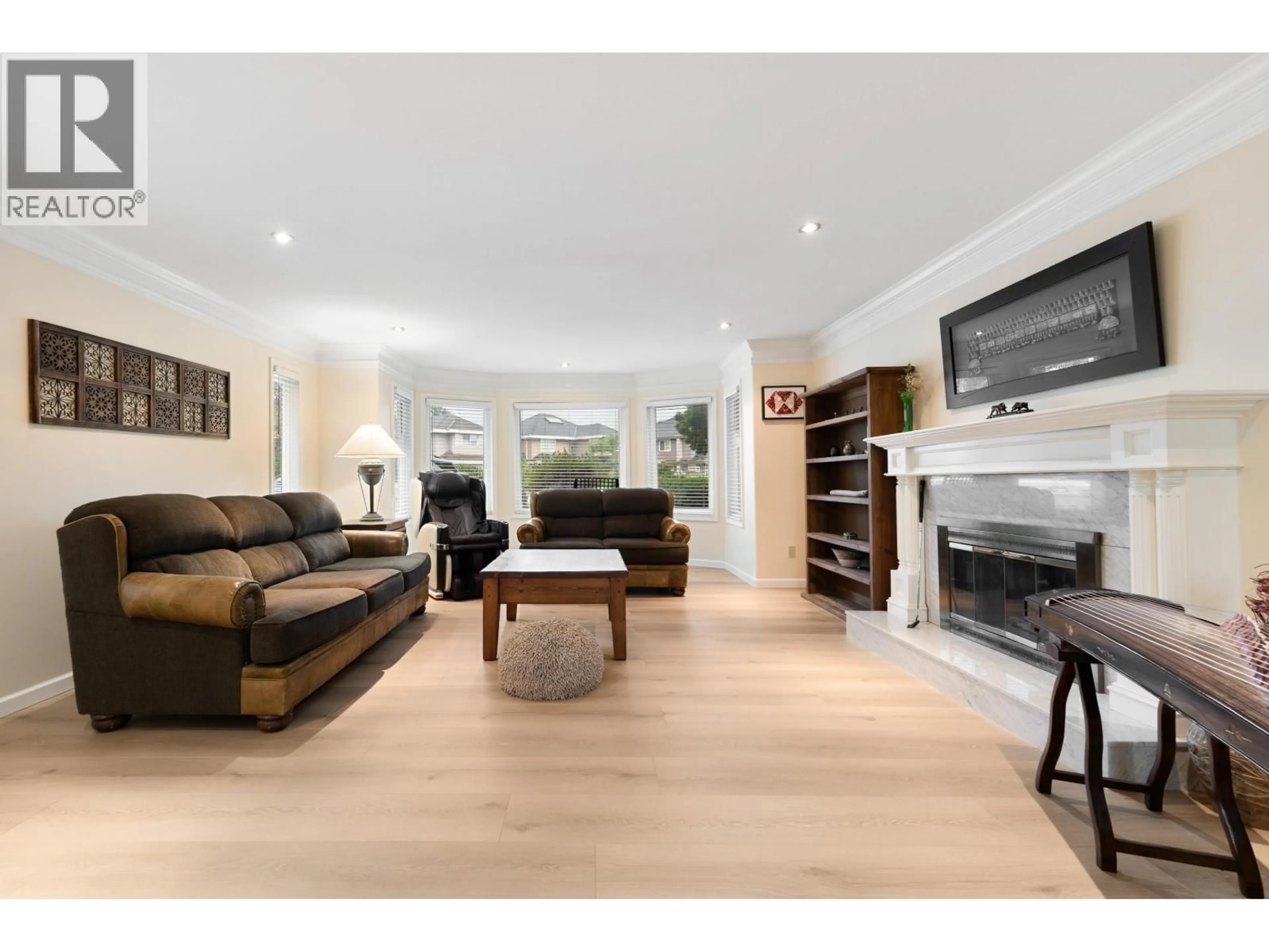 Living room with furniture, wood/laminate floor for 3817 MCKAY PLACE, Richmond British Columbia V6X3R6
