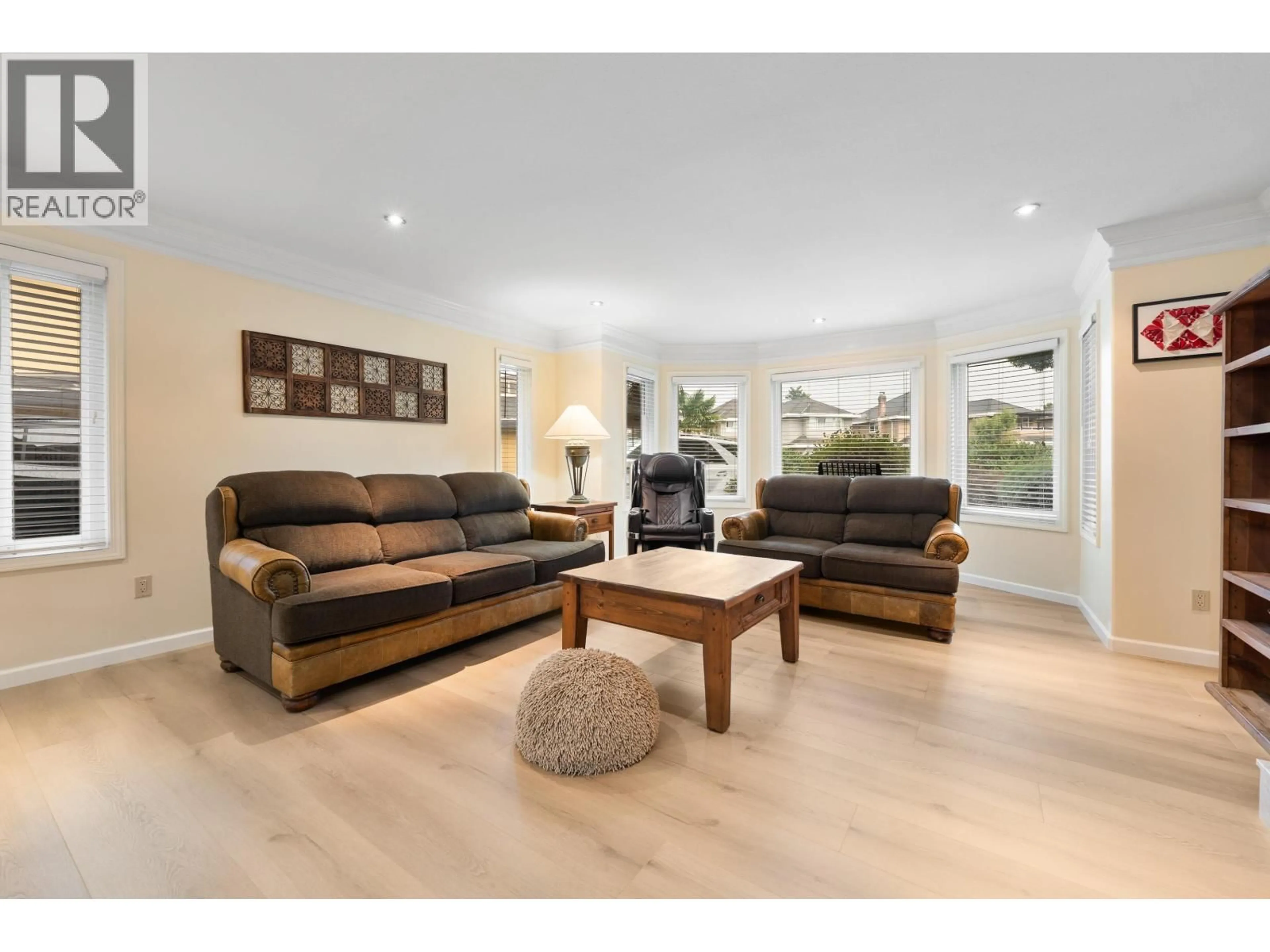 Living room with furniture, wood/laminate floor for 3817 MCKAY PLACE, Richmond British Columbia V6X3R6