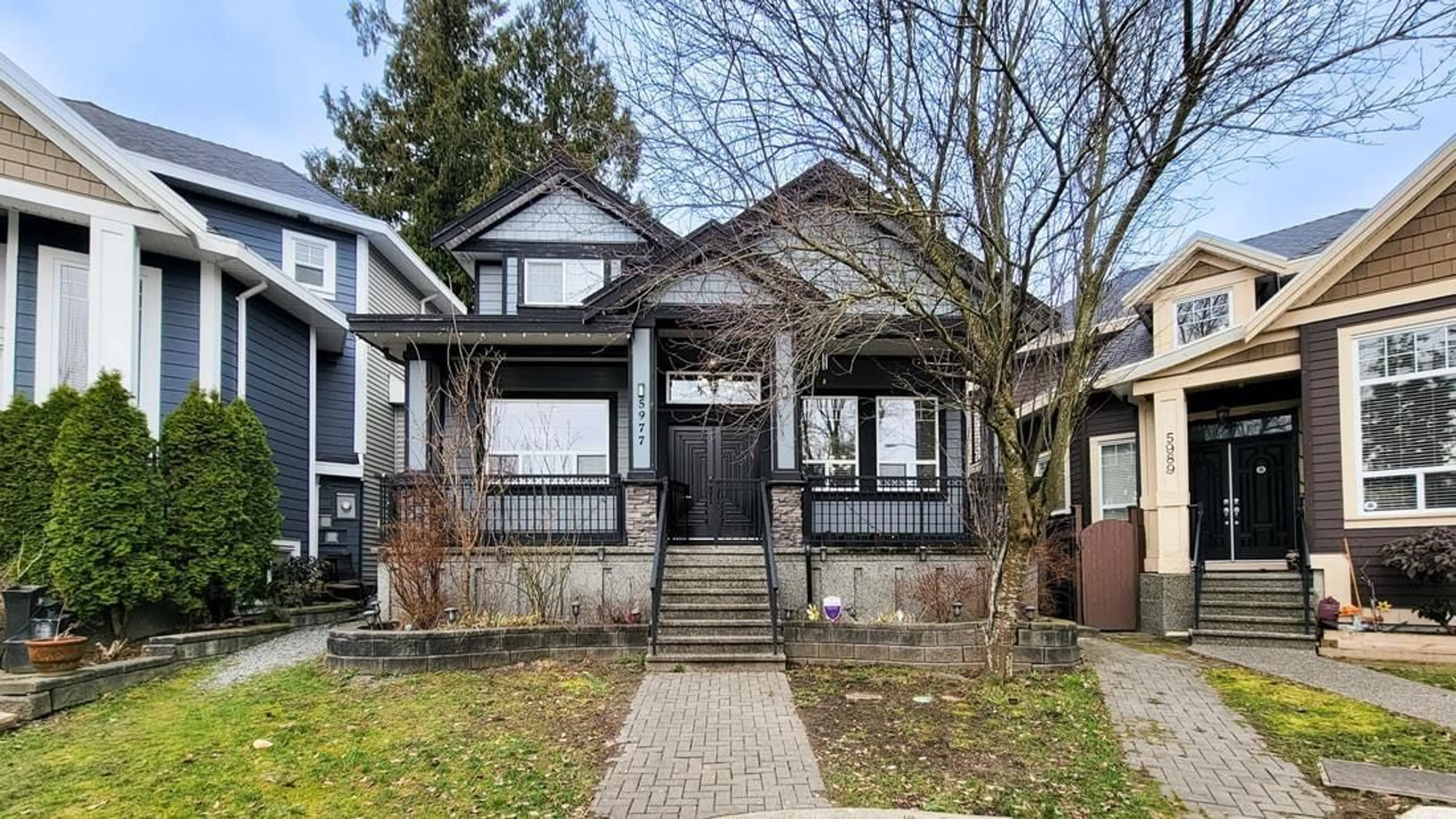 Home with brick exterior material, street for 5977 151, Surrey British Columbia V3S5L5
