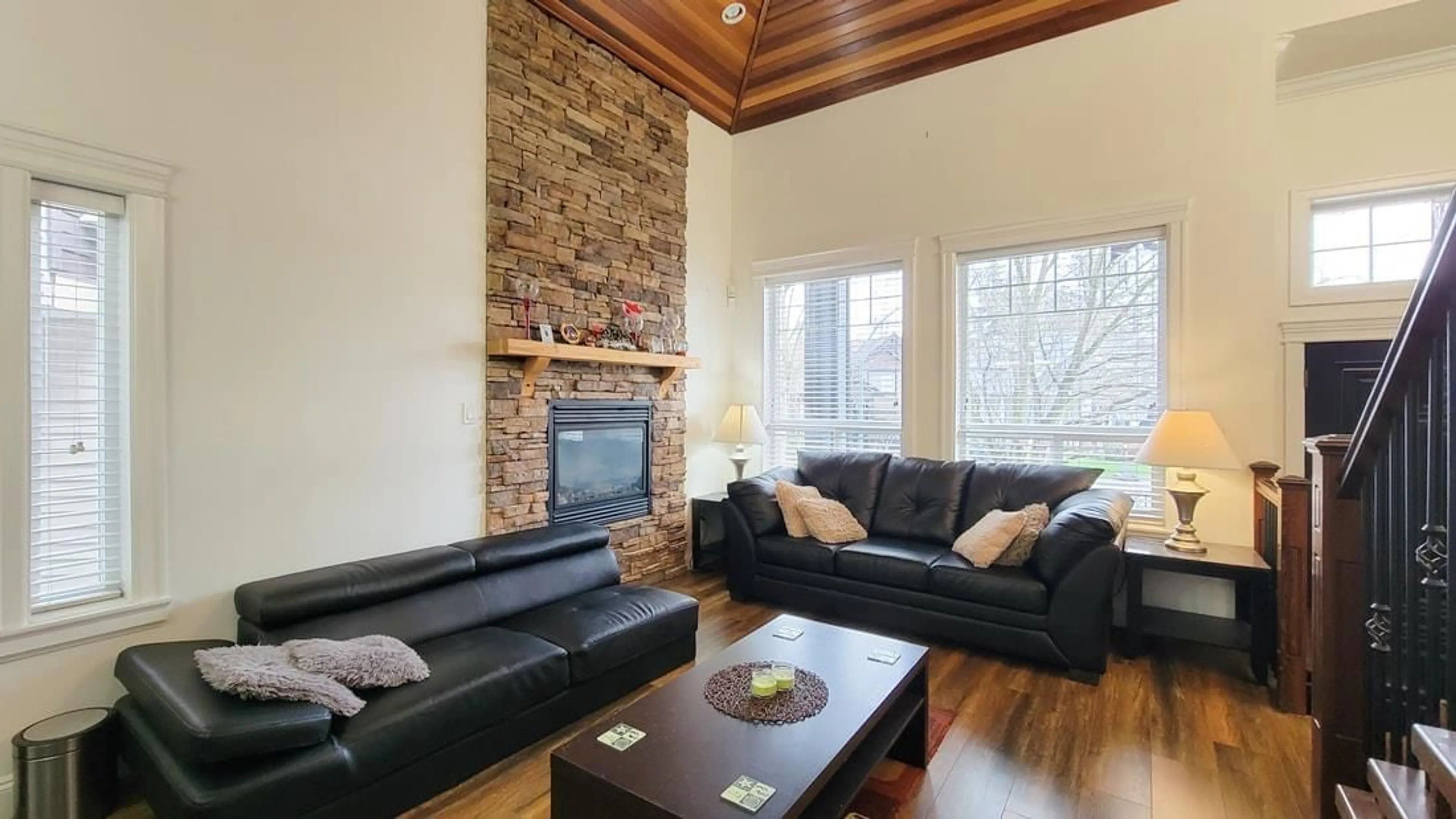 Living room with furniture, wood/laminate floor for 5977 151, Surrey British Columbia V3S5L5