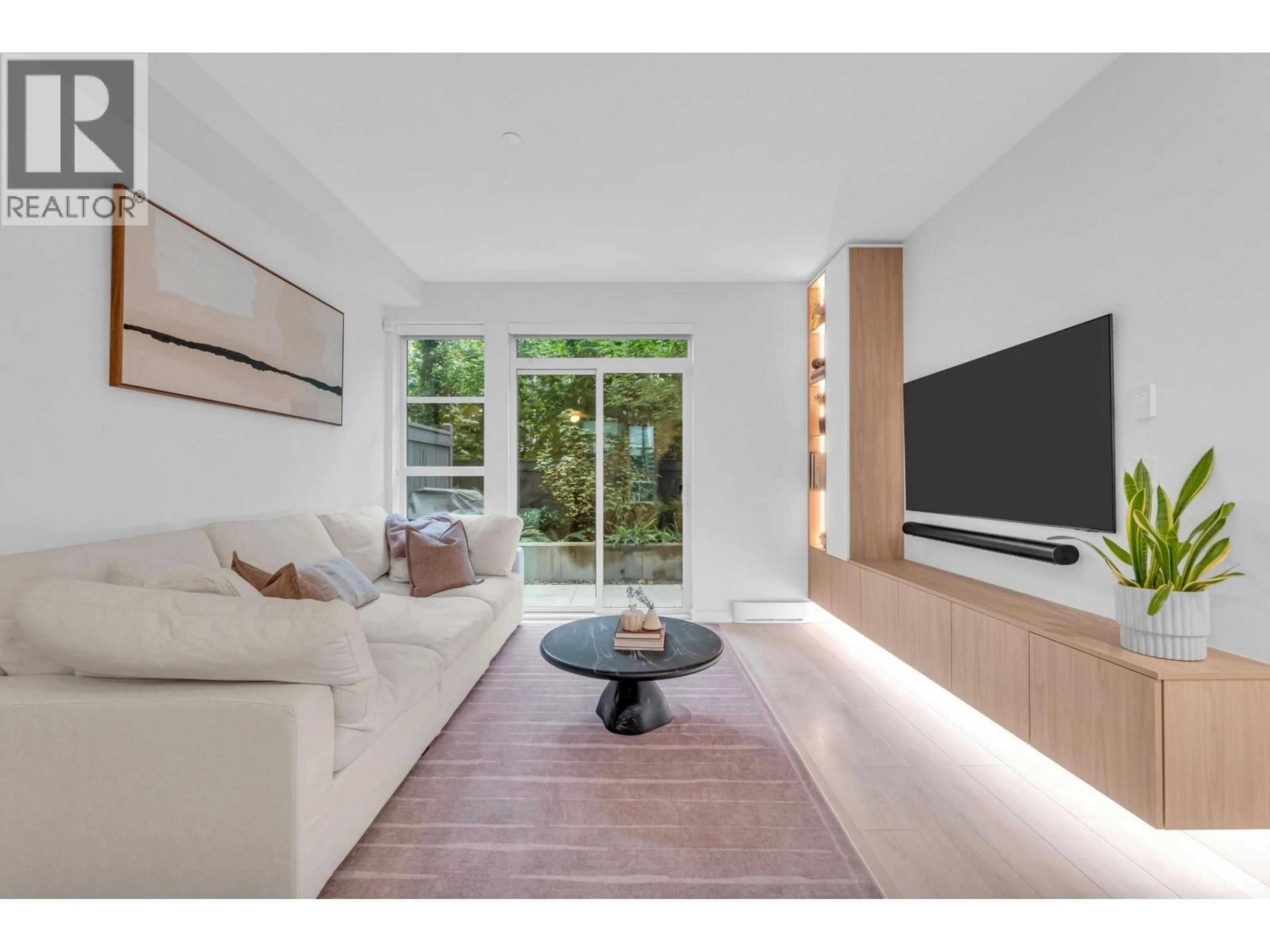 Living room with furniture, unknown for 128 - 2045 HERITAGE PARK LANE, North Vancouver British Columbia V7H0E3