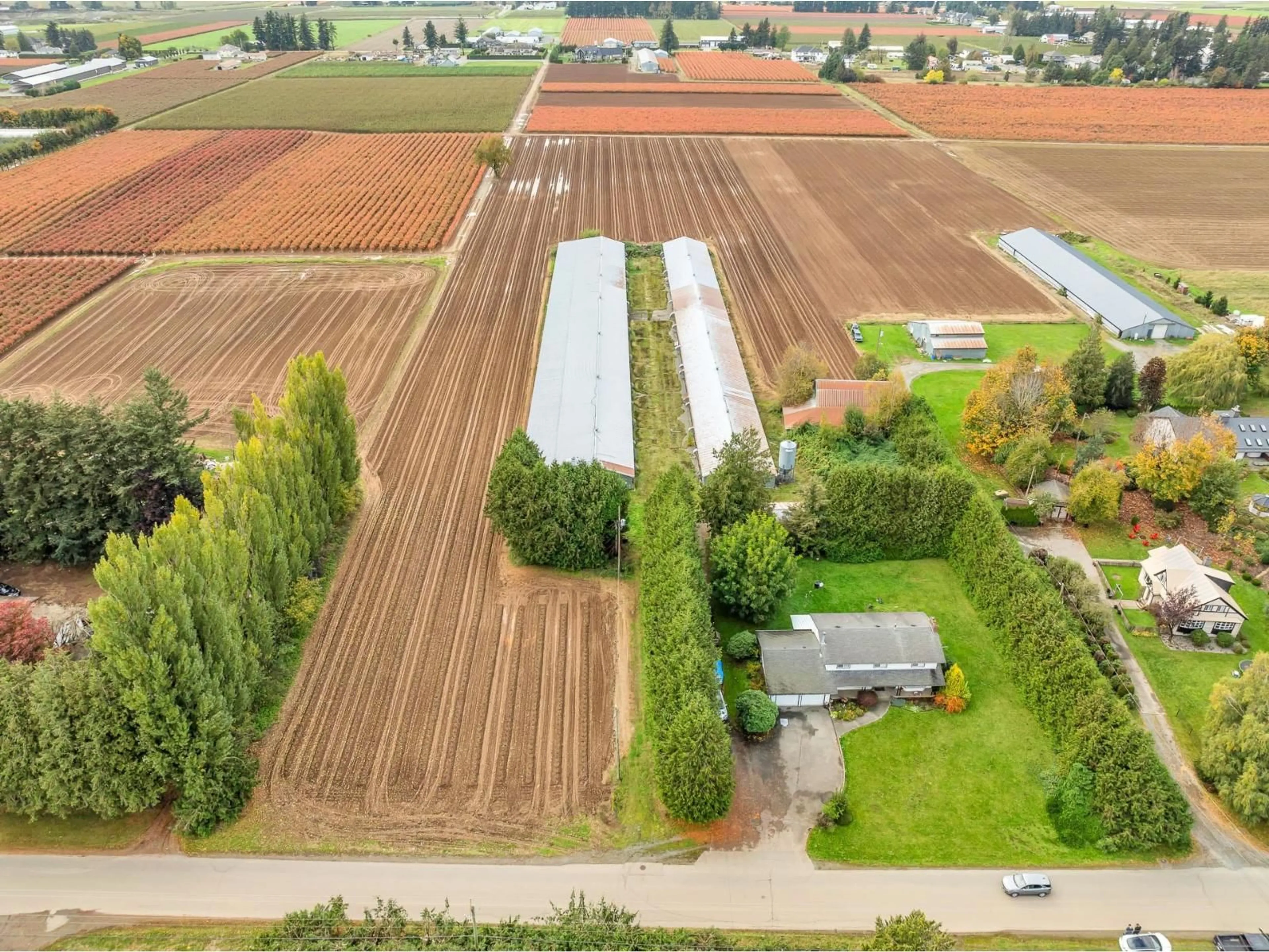 A pic from outside/outdoor area/front of a property/back of a property/a pic from drone, street for 515 GLADWIN, Abbotsford British Columbia V2T5Y1