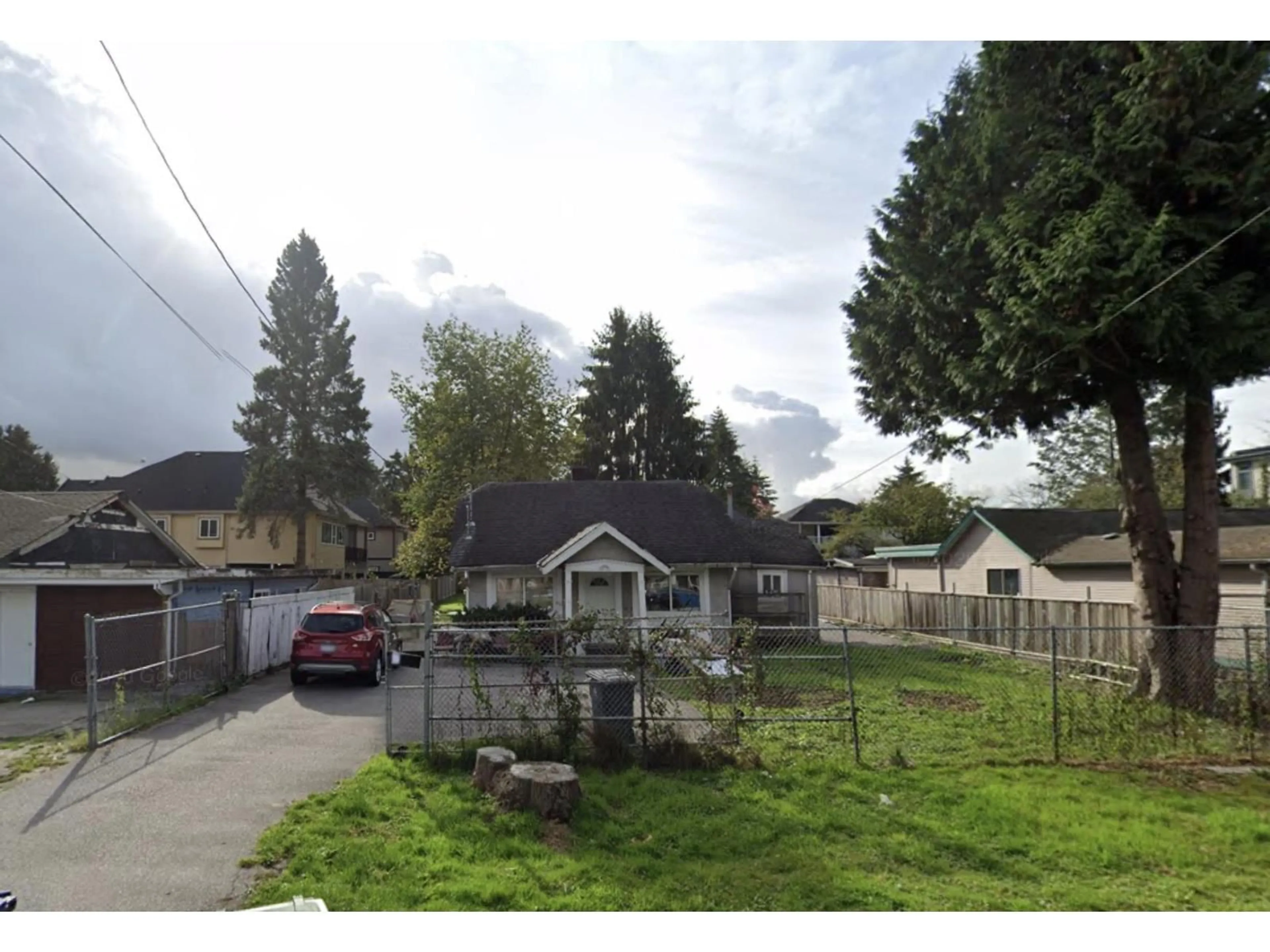 A pic from outside/outdoor area/front of a property/back of a property/a pic from drone, street for 13370 96, Surrey British Columbia V3V1Y4