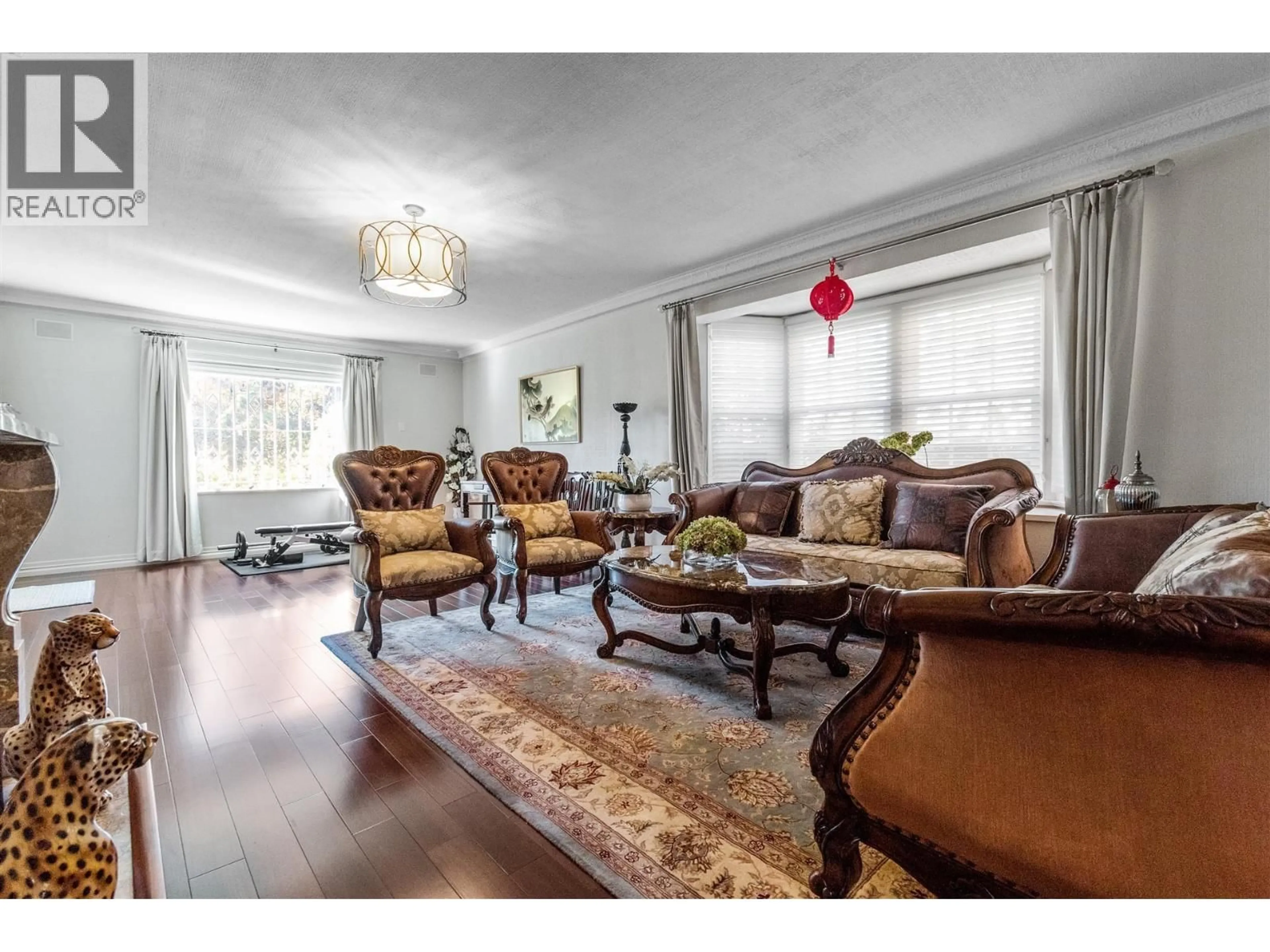 Living room with furniture, wood/laminate floor for 1726 32ND AVENUE, Vancouver British Columbia V6J3A7