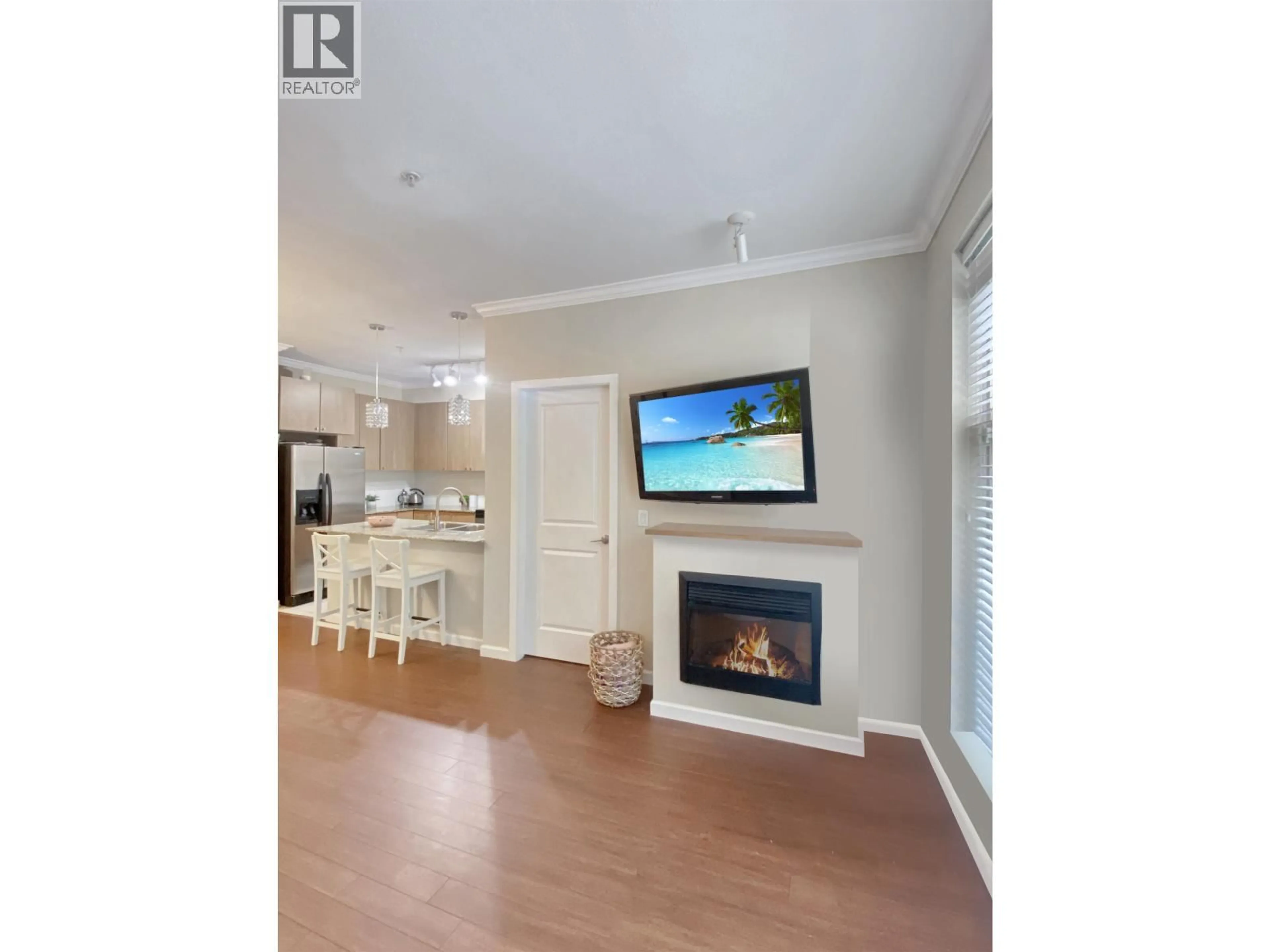 Open concept kitchen, wood/laminate floor for 102 - 2477 KELLY AVENUE, Port Coquitlam British Columbia V3C0B3