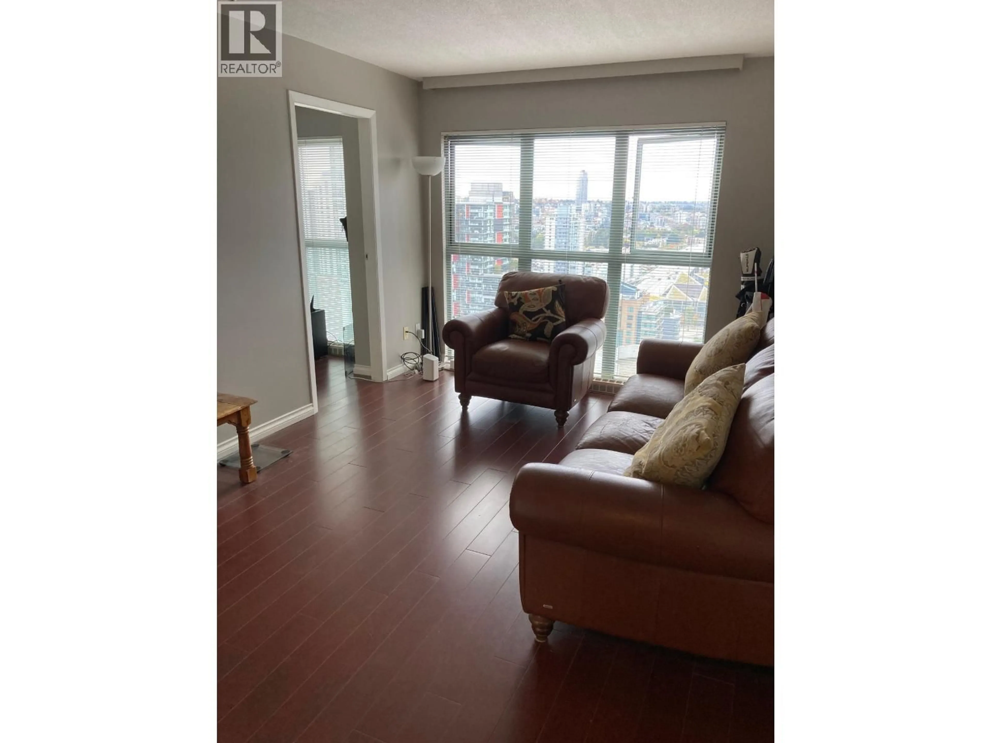 Living room with furniture, wood/laminate floor for 2402 - 1188 HOWE STREET, Vancouver British Columbia V6Z2S8