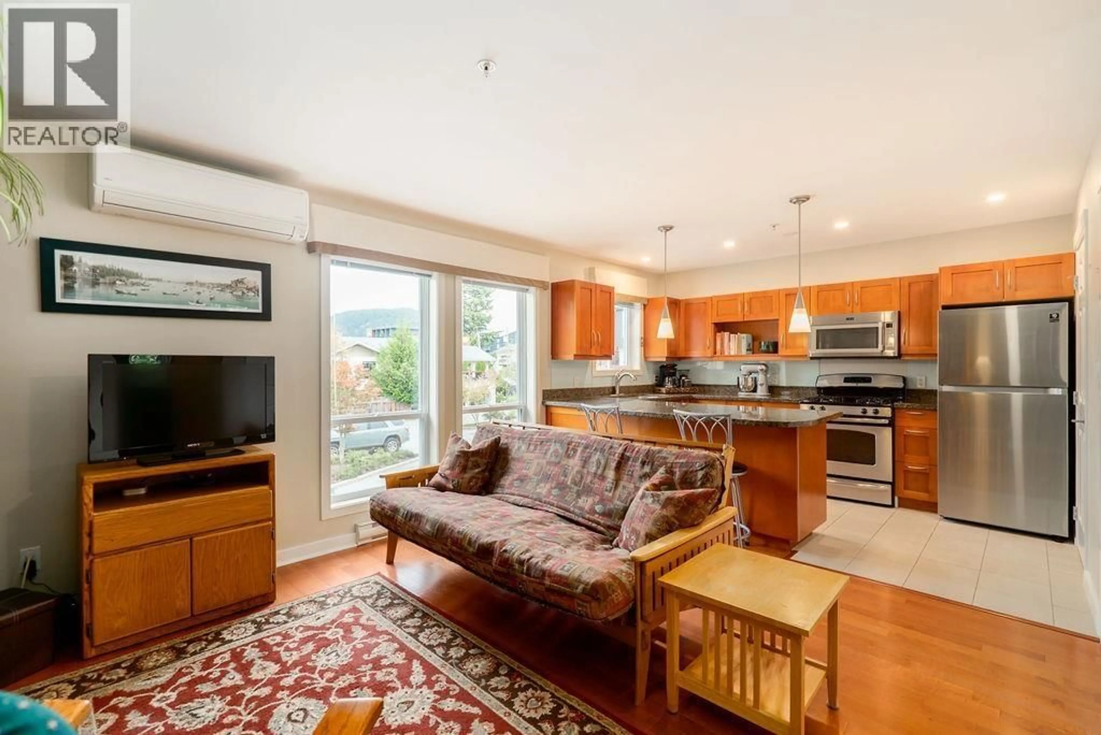 Open concept kitchen, wood/laminate floor for 3 - 1233 MAIN STREET, Squamish British Columbia V8B0P7