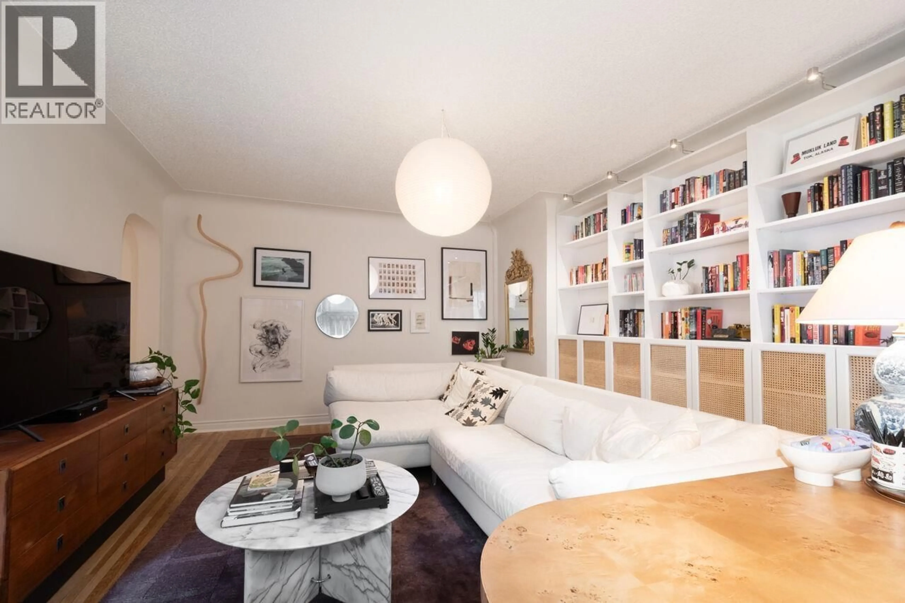 Living room with furniture, unknown for 103 - 985 JERVIS STREET, Vancouver British Columbia V6E2B7