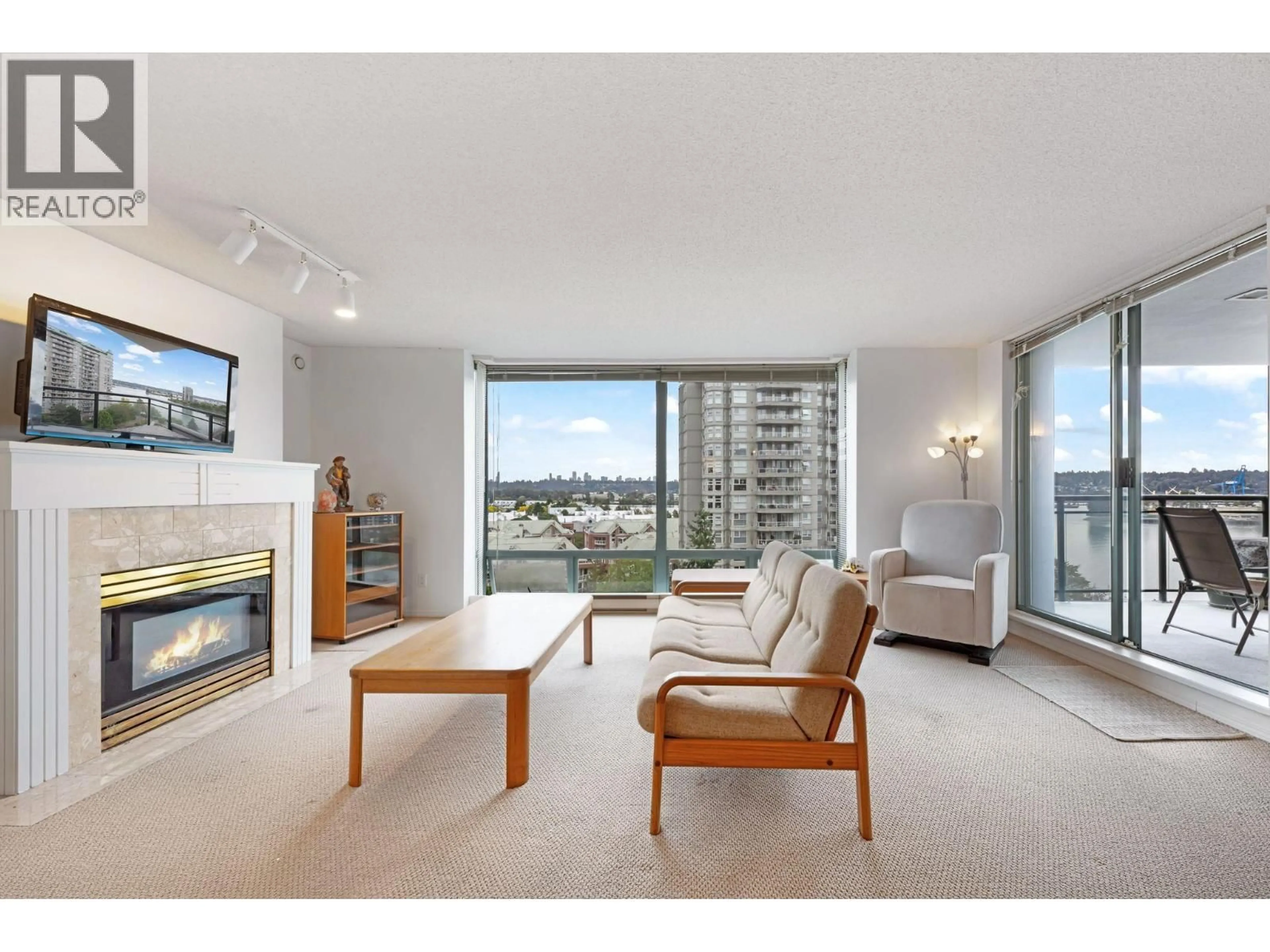 Living room with furniture, unknown for 1001 - 8 LAGUNA COURT, New Westminster British Columbia V3M6M6