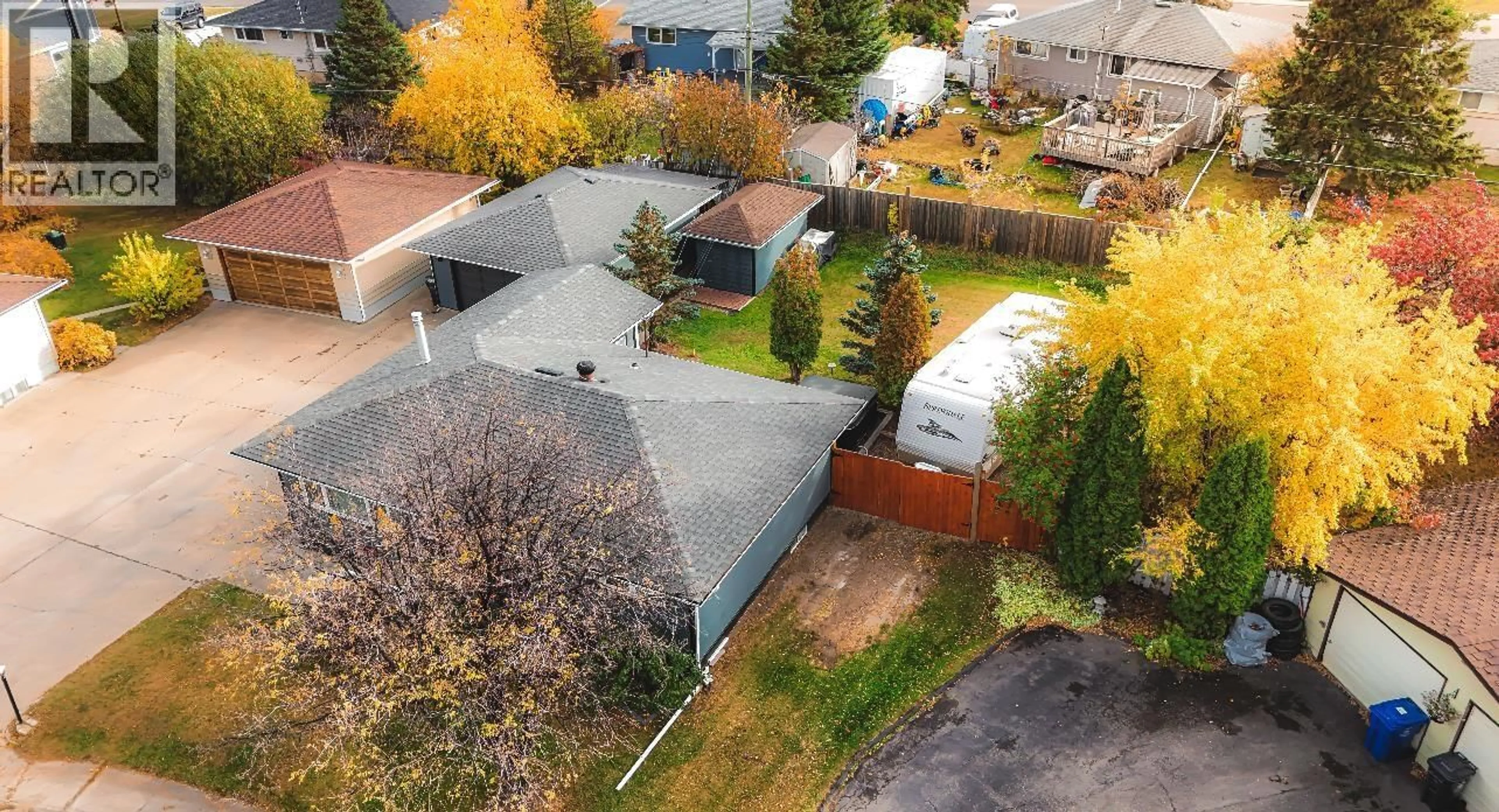 A pic from outside/outdoor area/front of a property/back of a property/a pic from drone, street for 9603 111 AVENUE, Fort St. John British Columbia V1J2T9