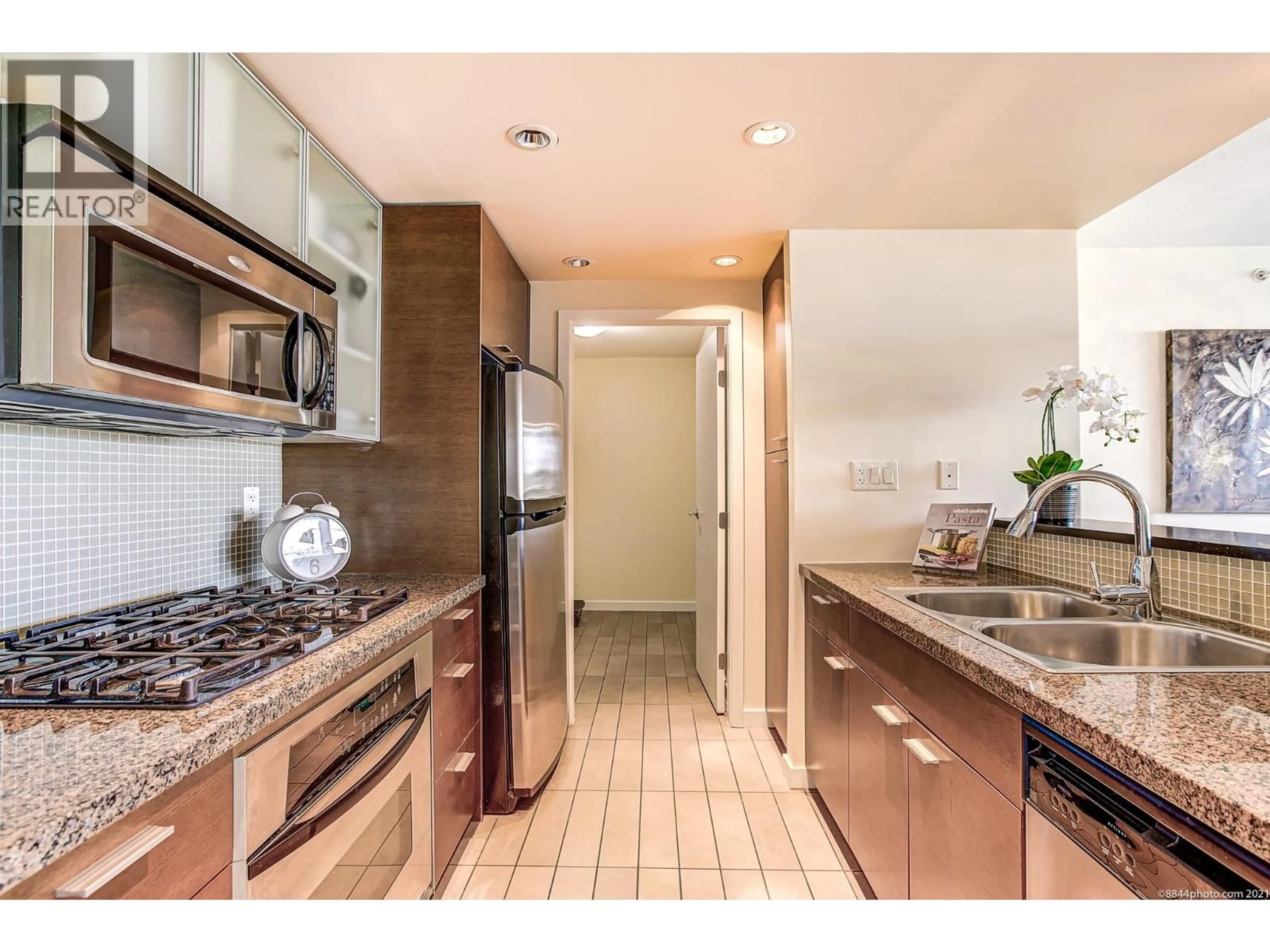 Standard kitchen, ceramic/tile floor for 1101 - 980 COOPERAGE WAY, Vancouver British Columbia V6B0C3