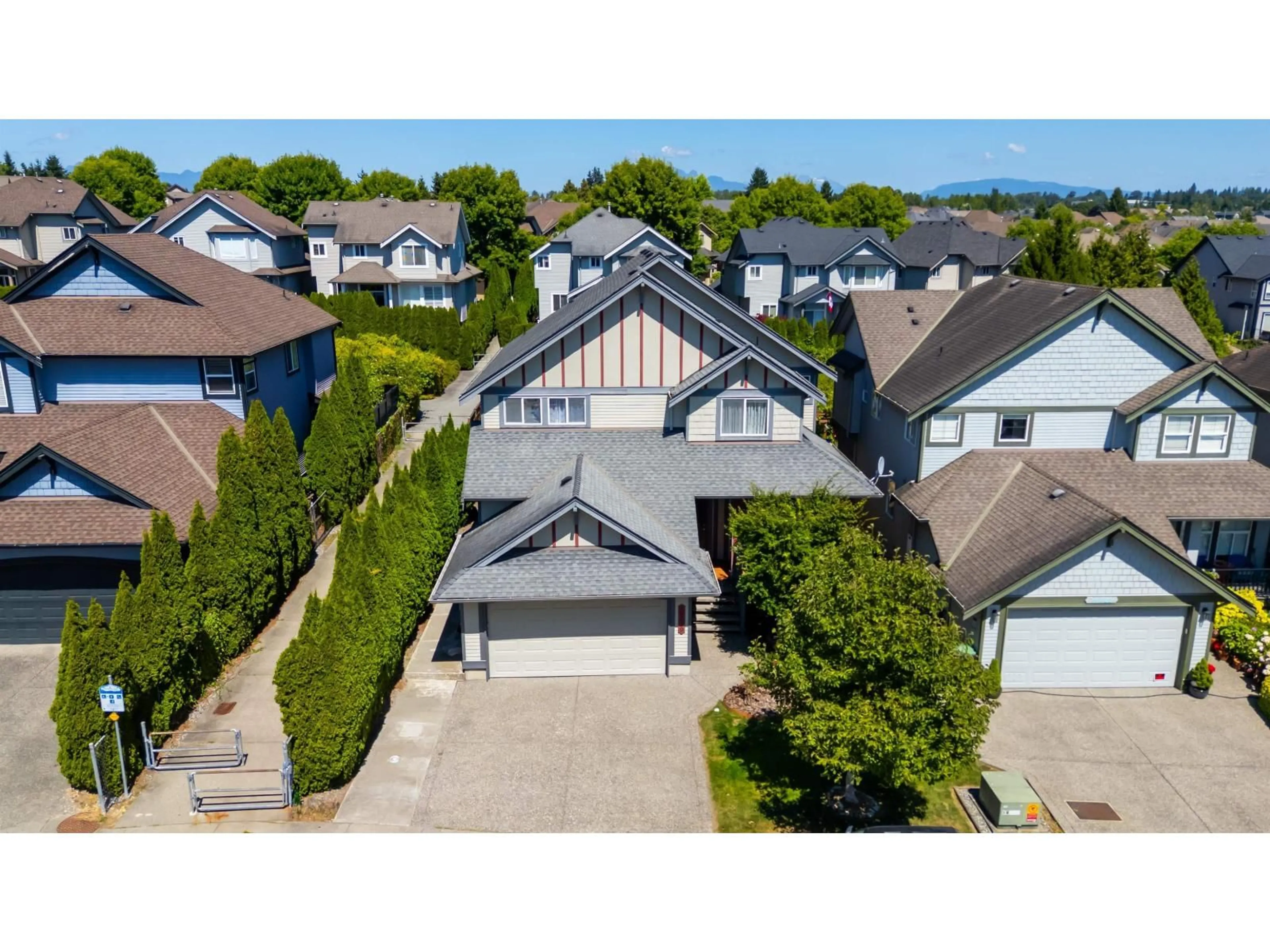 A pic from outside/outdoor area/front of a property/back of a property/a pic from drone, street for 19629 68A, Langley British Columbia V2Y3H2