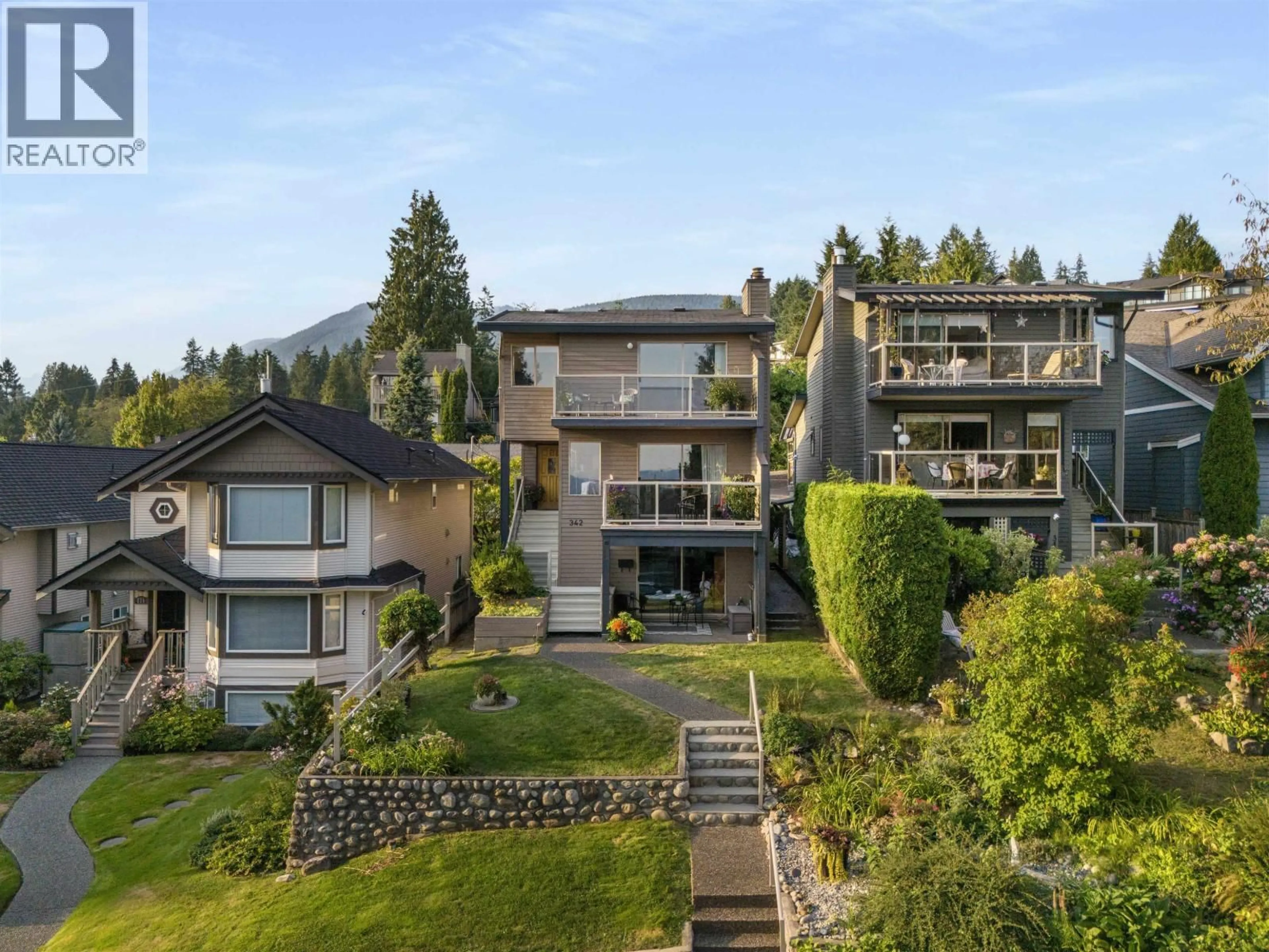 A pic from outside/outdoor area/front of a property/back of a property/a pic from drone, mountain view for 342 26TH STREET, North Vancouver British Columbia V7N1B1