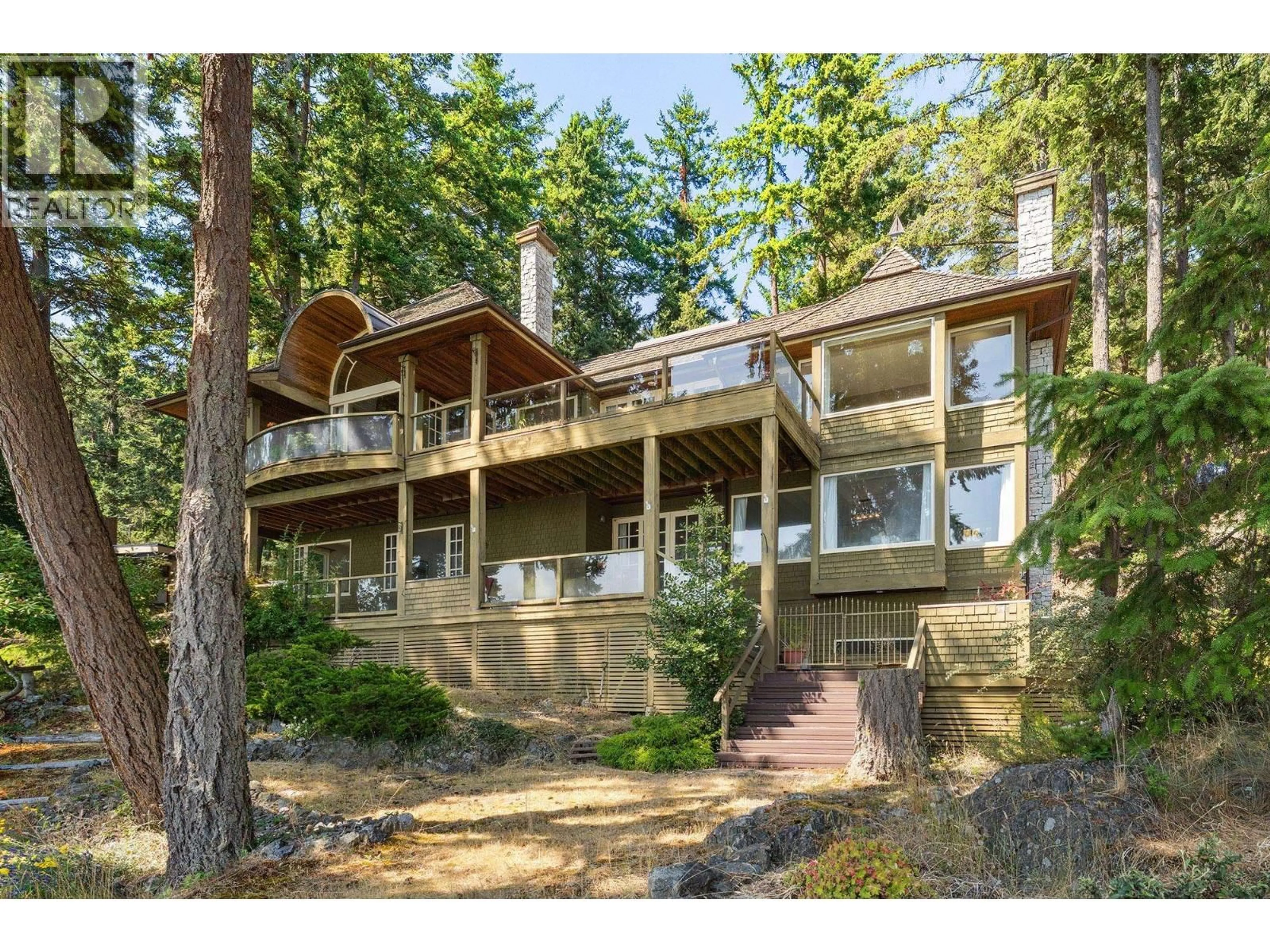 Home with vinyl exterior material, forest/trees view for 1251 FAIRWEATHER ROAD, Bowen Island British Columbia V0N1G2