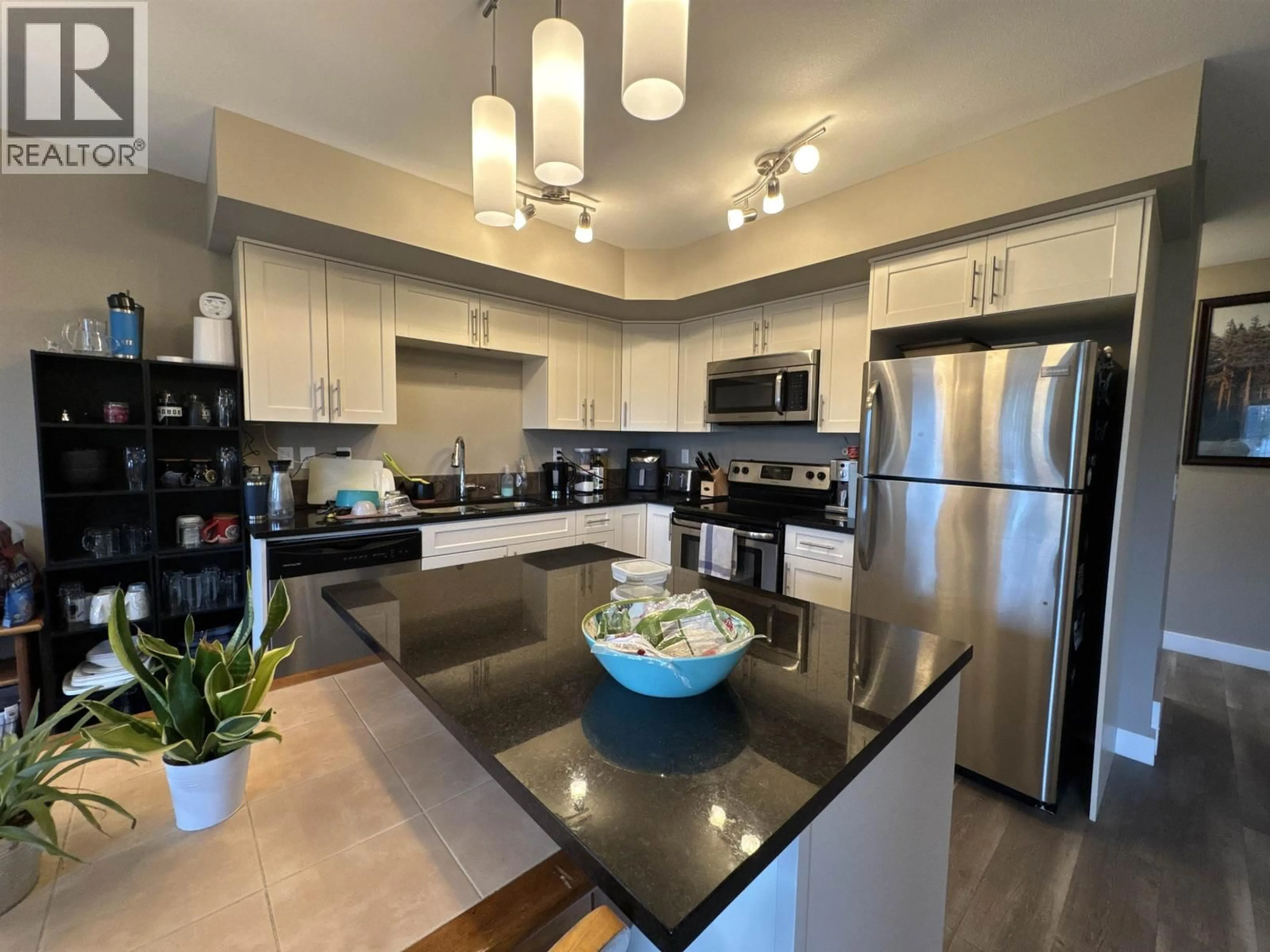 Open concept kitchen, unknown for 119 - 10104 114A AVENUE, Fort St. John British Columbia V1J0K5