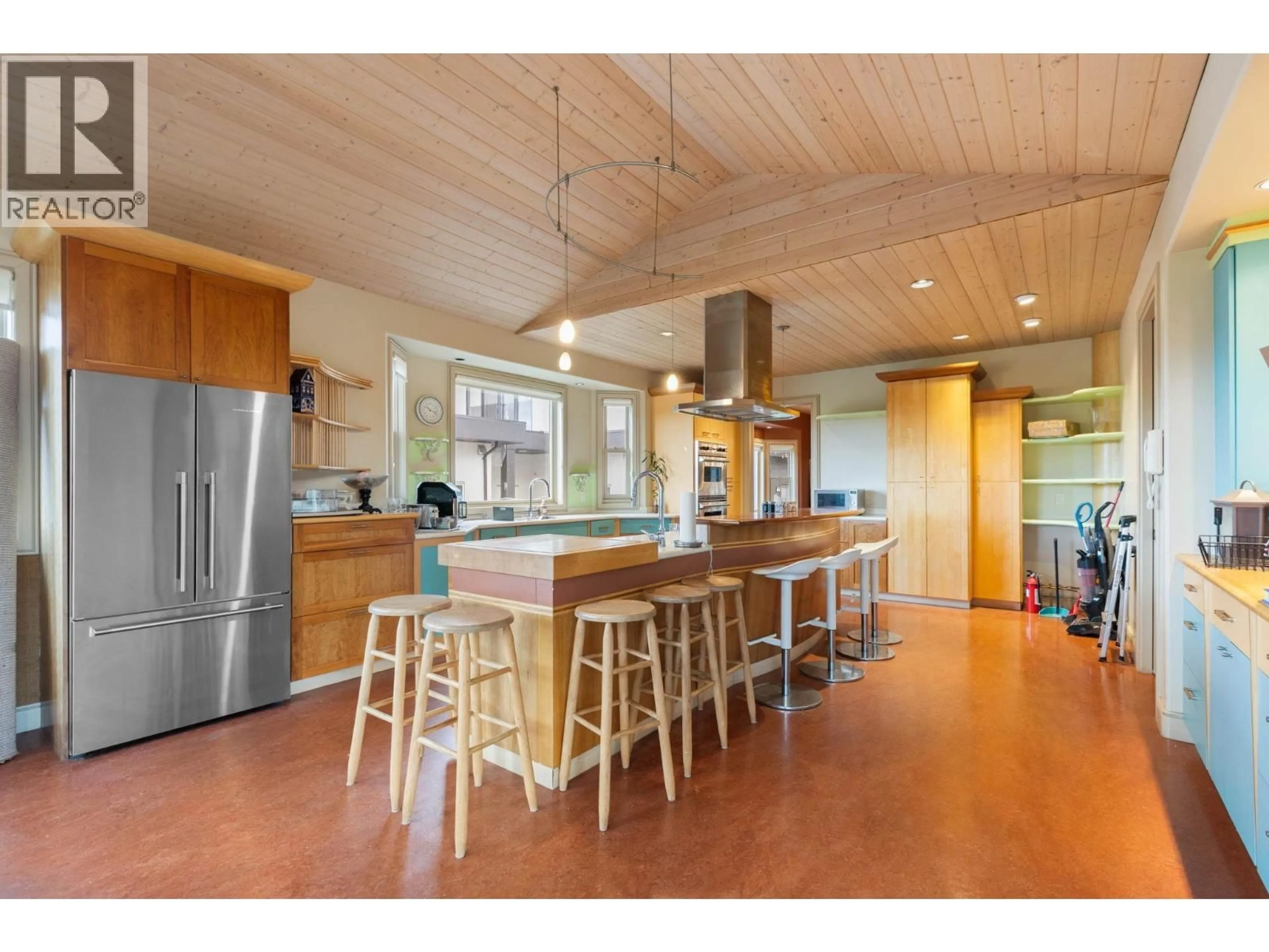 Open concept kitchen, wood/laminate floor for 11520 BLUNDELL ROAD, Richmond British Columbia V6Y1L3