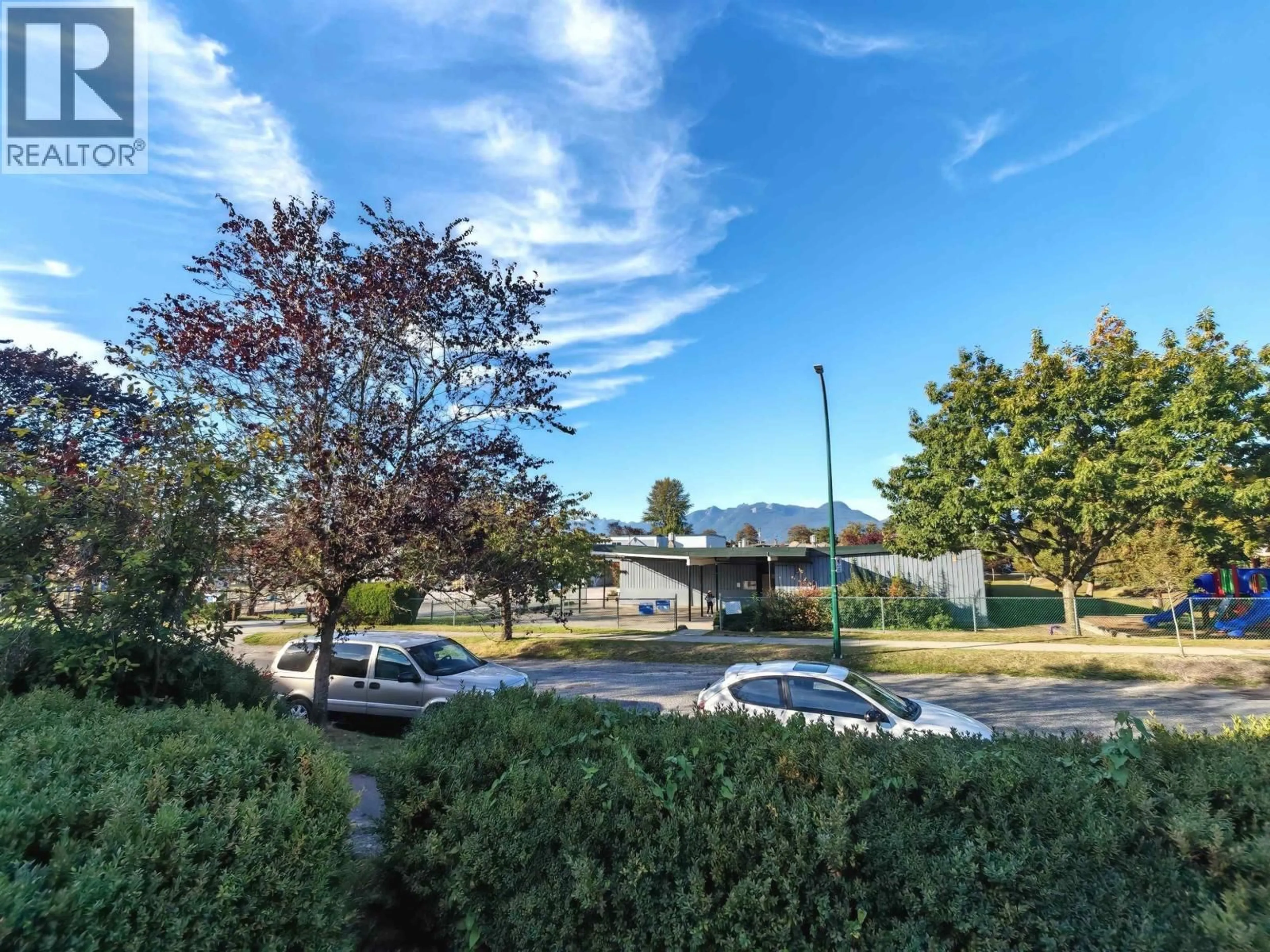 A pic from outside/outdoor area/front of a property/back of a property/a pic from drone, mountain view for 2686 3RD AVENUE, Vancouver British Columbia V5M1H2