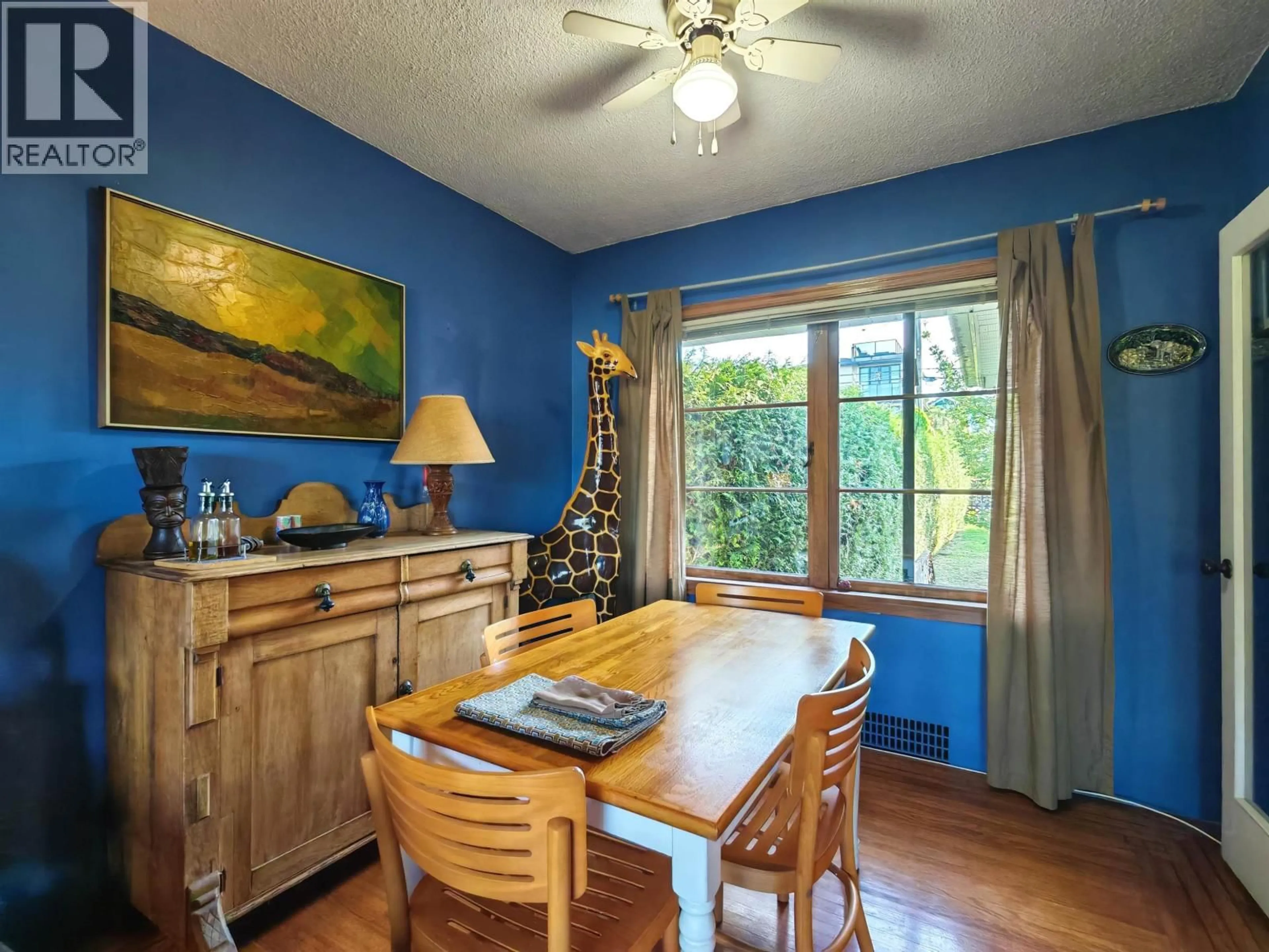 Dining room, wood/laminate floor for 2686 3RD AVENUE, Vancouver British Columbia V5M1H2