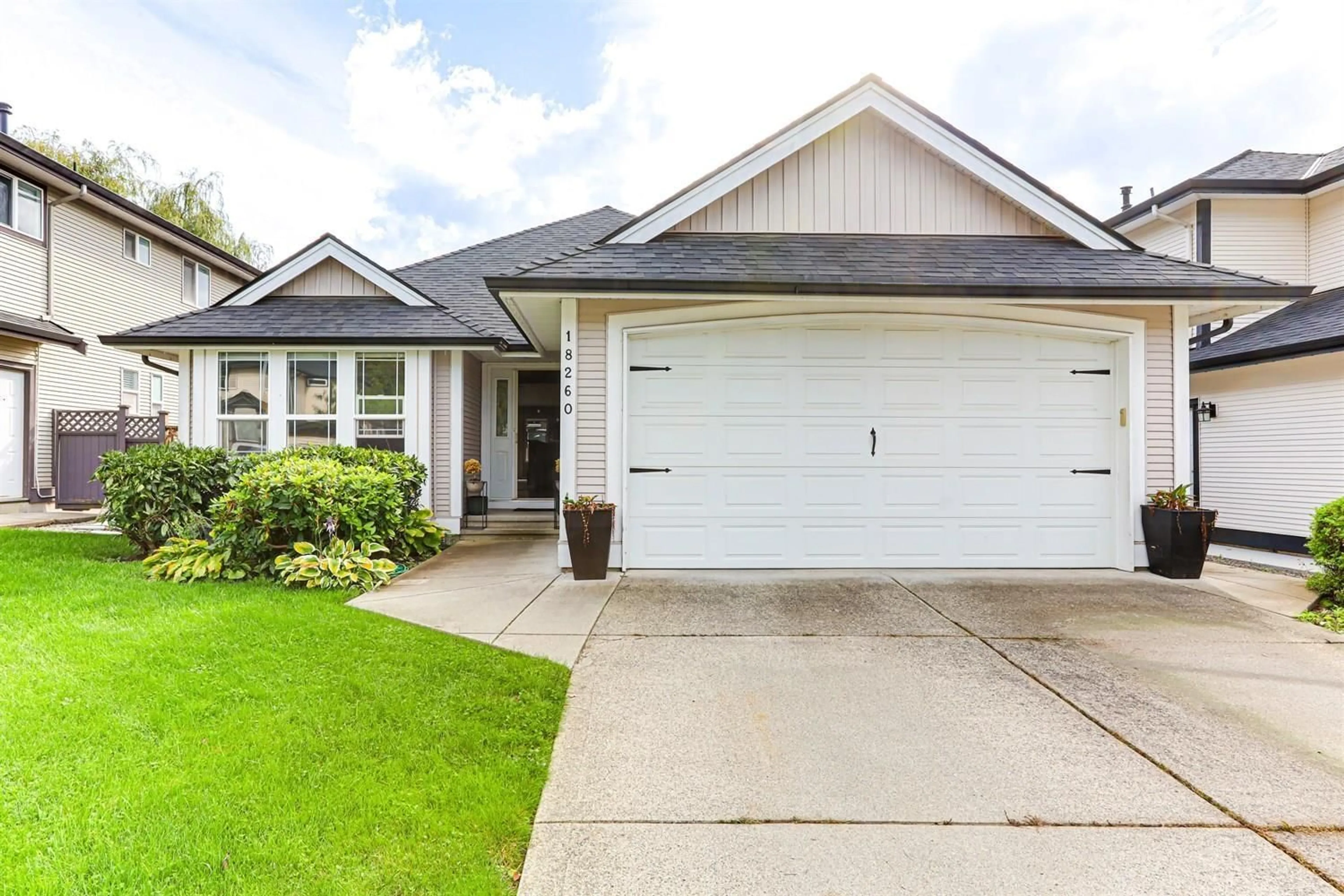 Home with vinyl exterior material, street for 18260 69, Surrey British Columbia V3S9H5