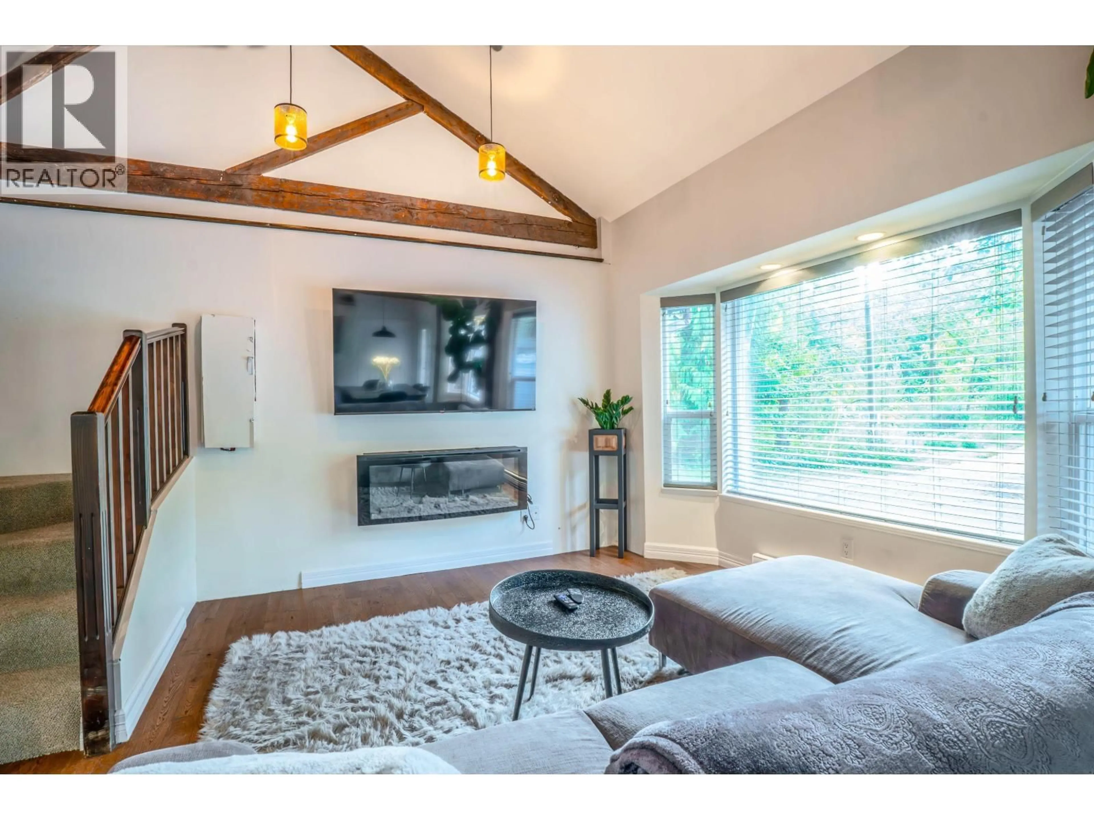 Living room with furniture, wood/laminate floor for 26651 CUNNINGHAM AVENUE, Maple Ridge British Columbia V2W1M8