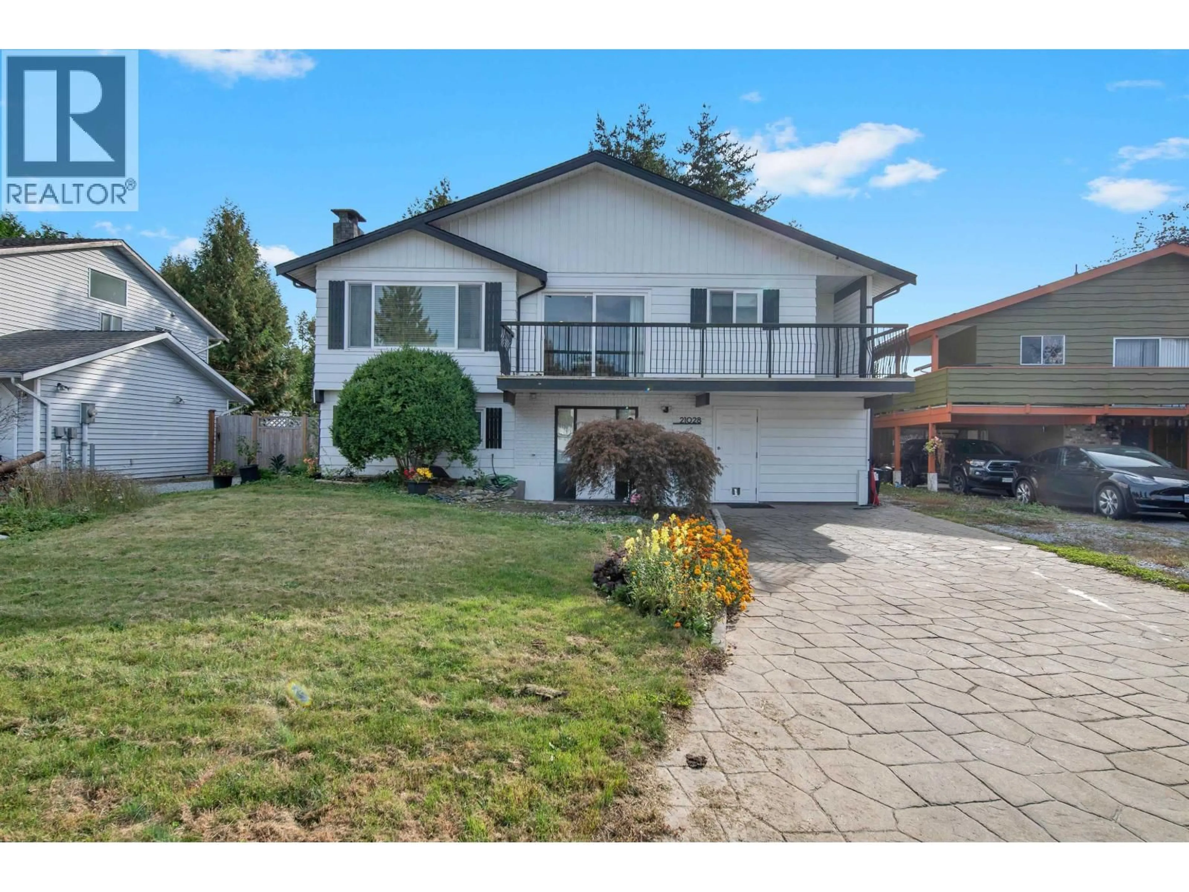Home with vinyl exterior material, street for 21028 119 AVENUE, Maple Ridge British Columbia V2X7N7