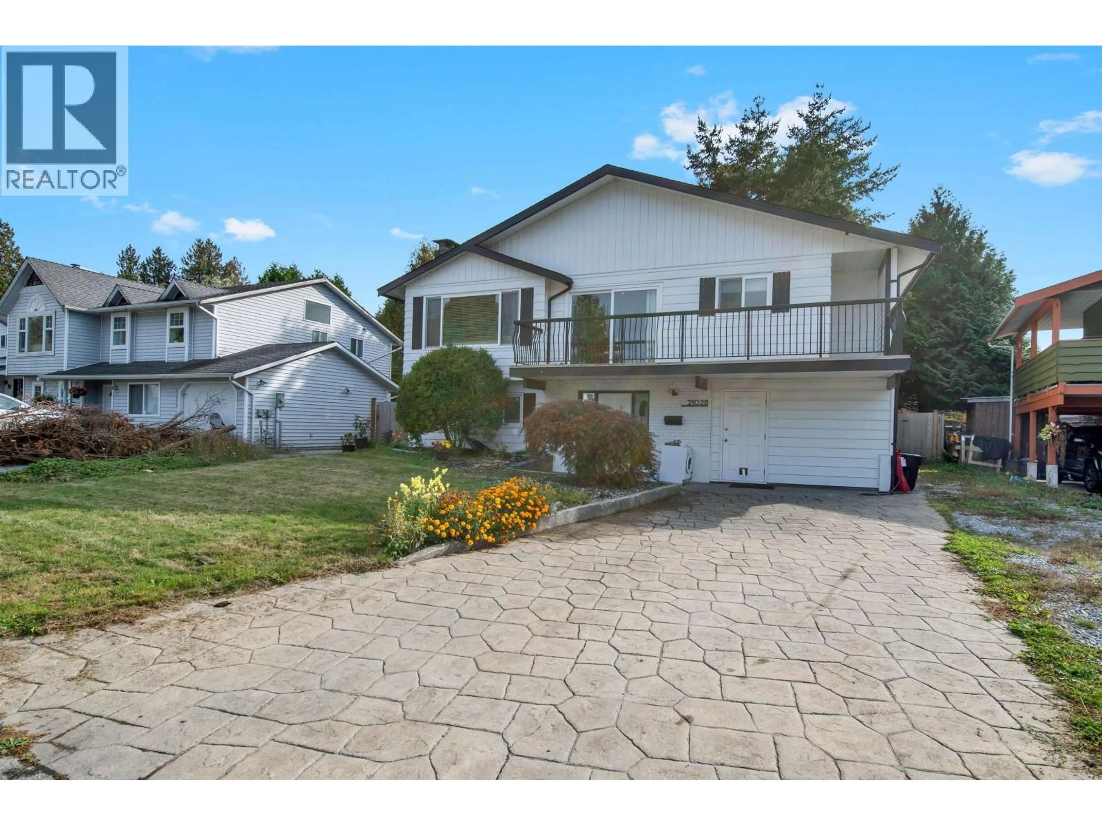Home with vinyl exterior material, street for 21028 119 AVENUE, Maple Ridge British Columbia V2X7N7