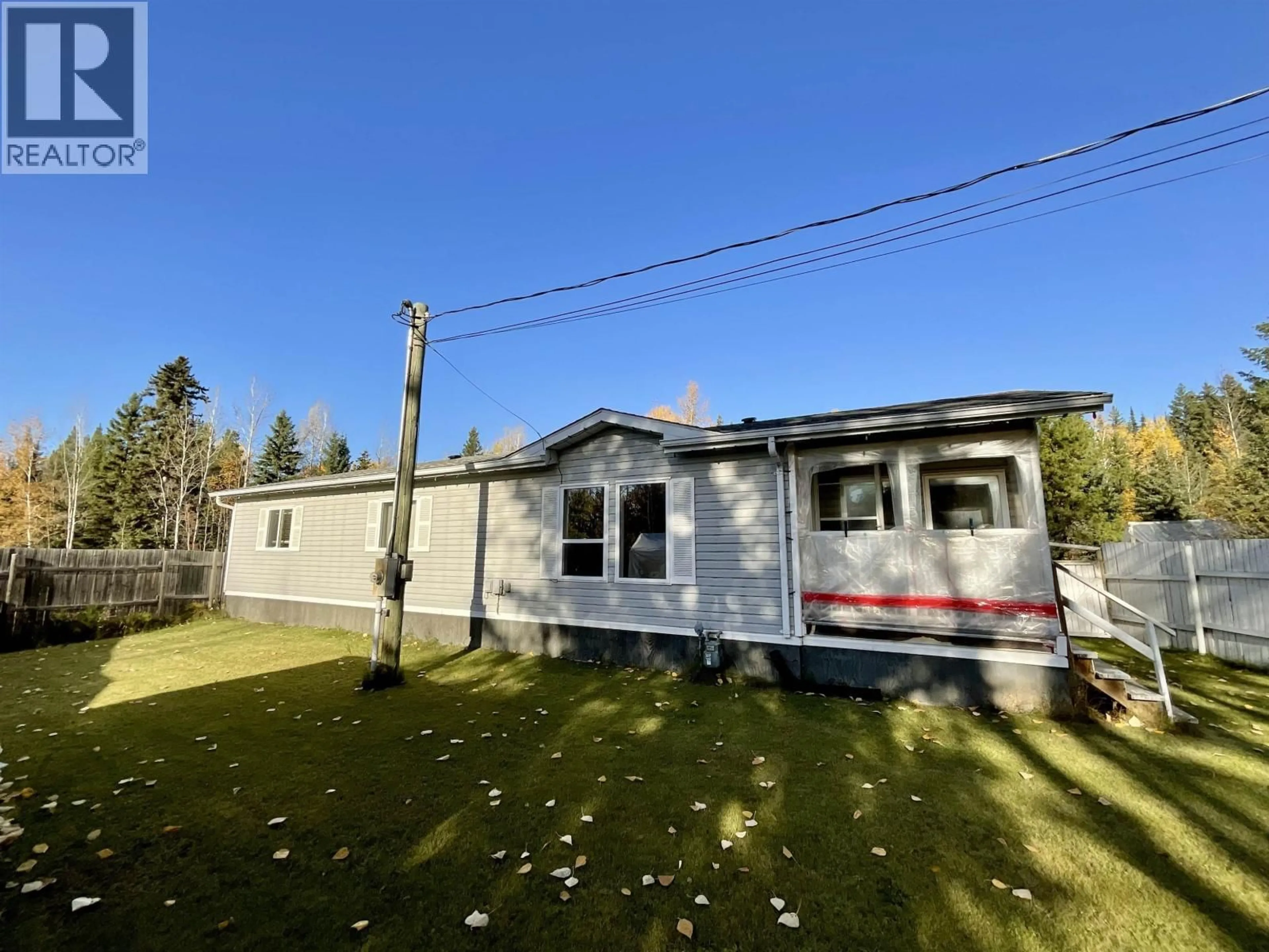 Home with vinyl exterior material, street for 1207 BIG BEN ROAD, Quesnel British Columbia V2J6V1