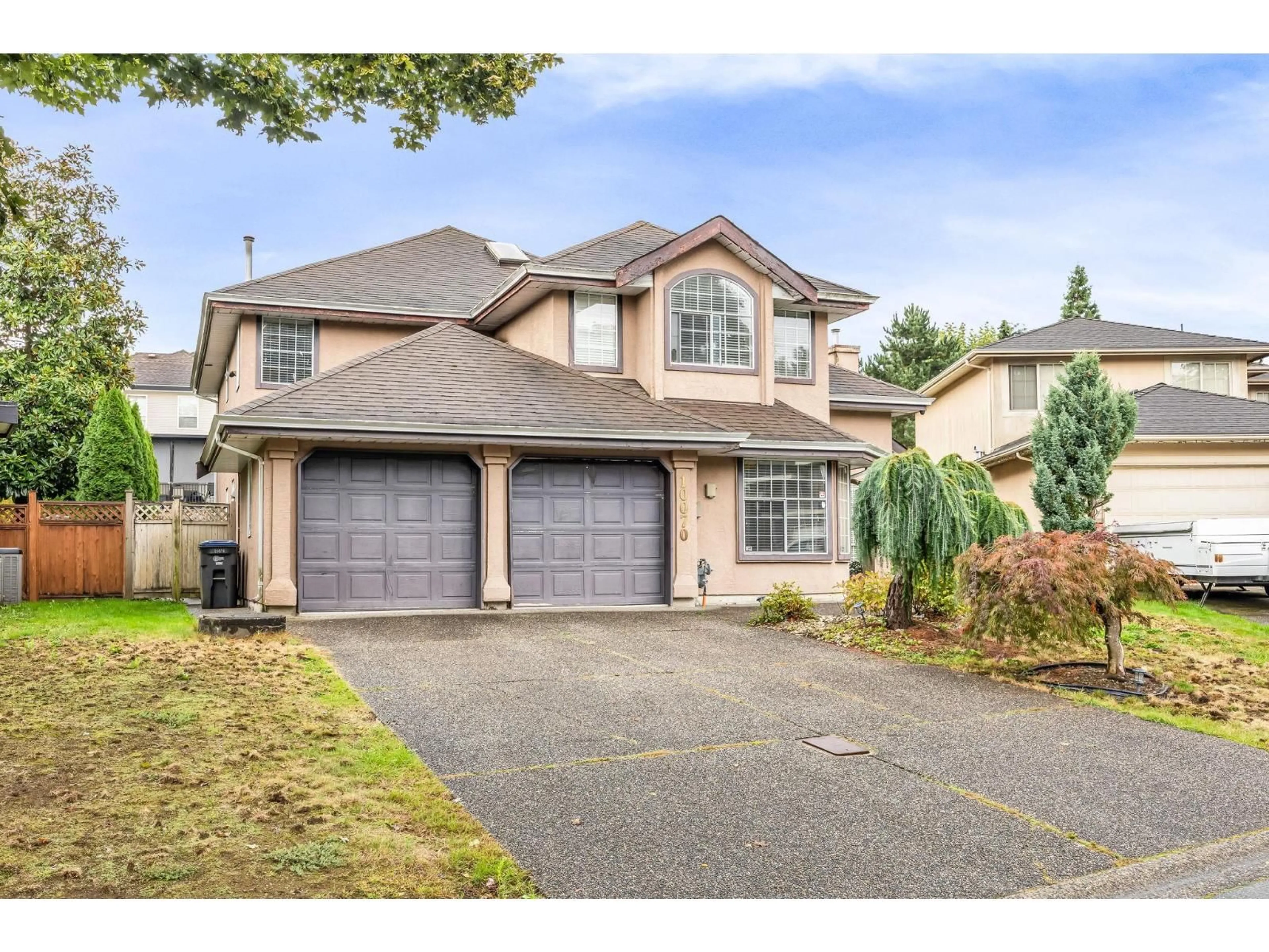 Home with vinyl exterior material, street for 10070 171A, Surrey British Columbia V4N3L3