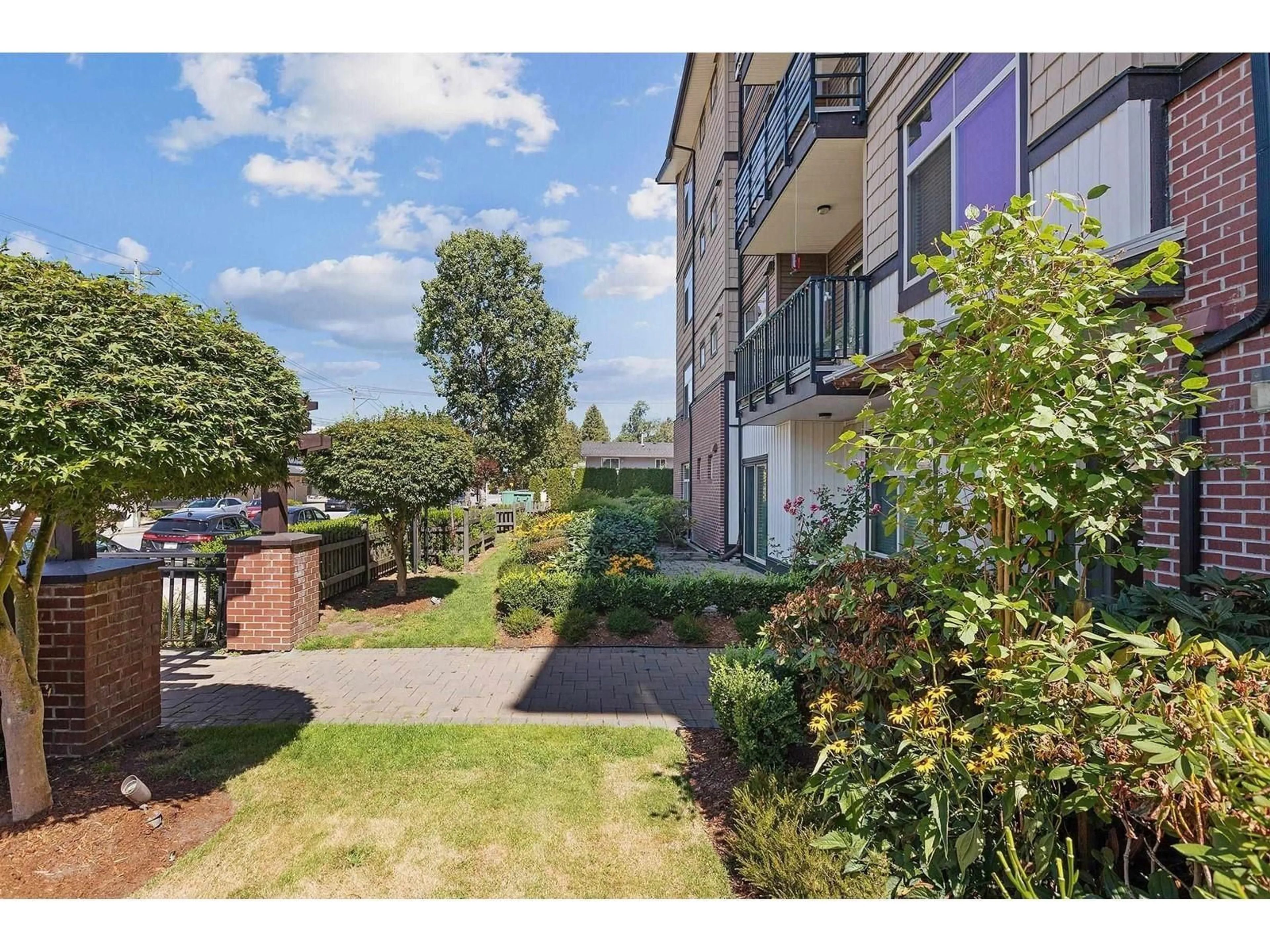 A pic from outside/outdoor area/front of a property/back of a property/a pic from drone, street for 411 - 8168 120A, Surrey British Columbia V3W3P3