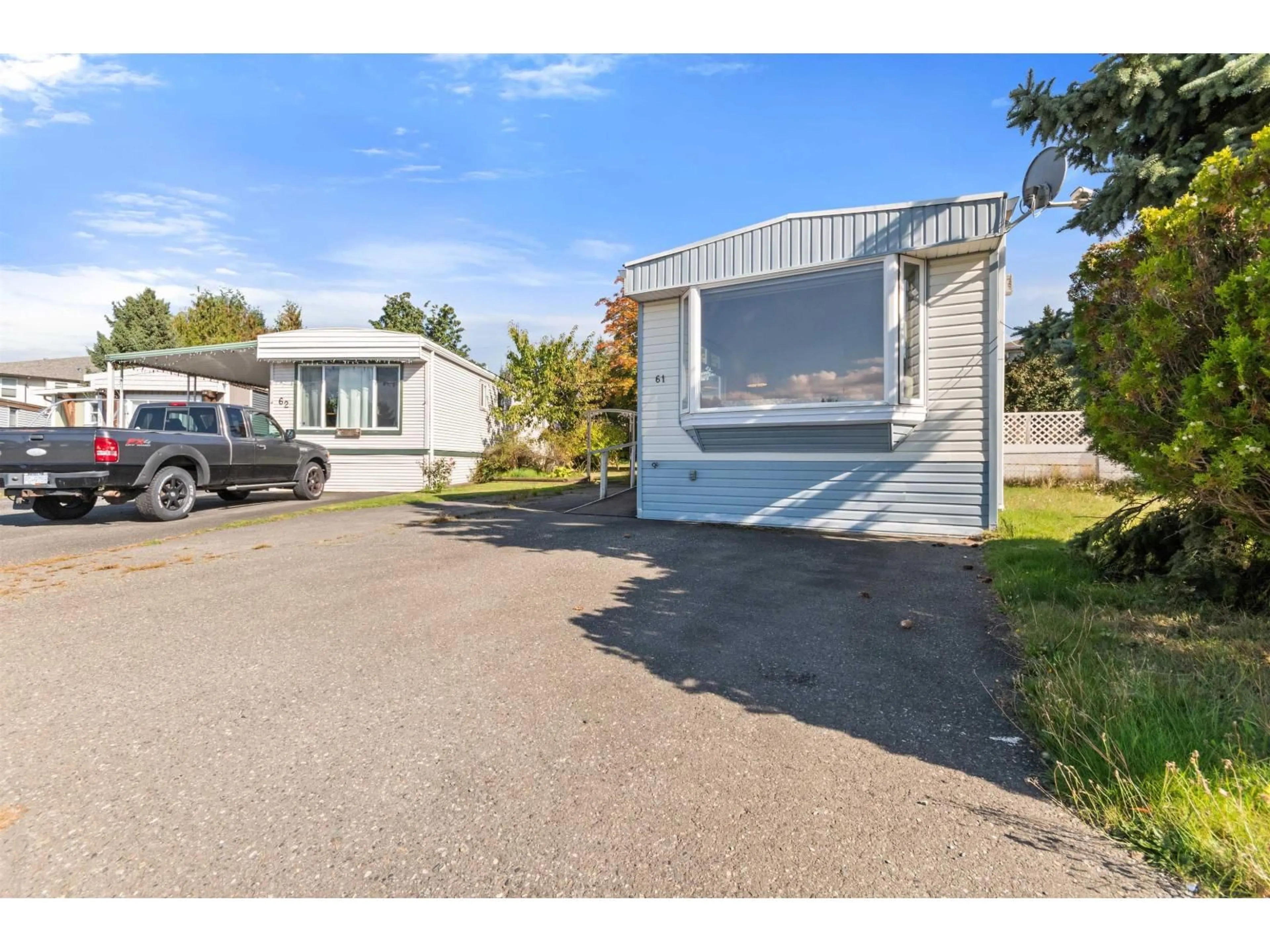 A pic from outside/outdoor area/front of a property/back of a property/a pic from drone, street for 61 - 45640 WATSON ROAD, Chilliwack British Columbia V2R3R1