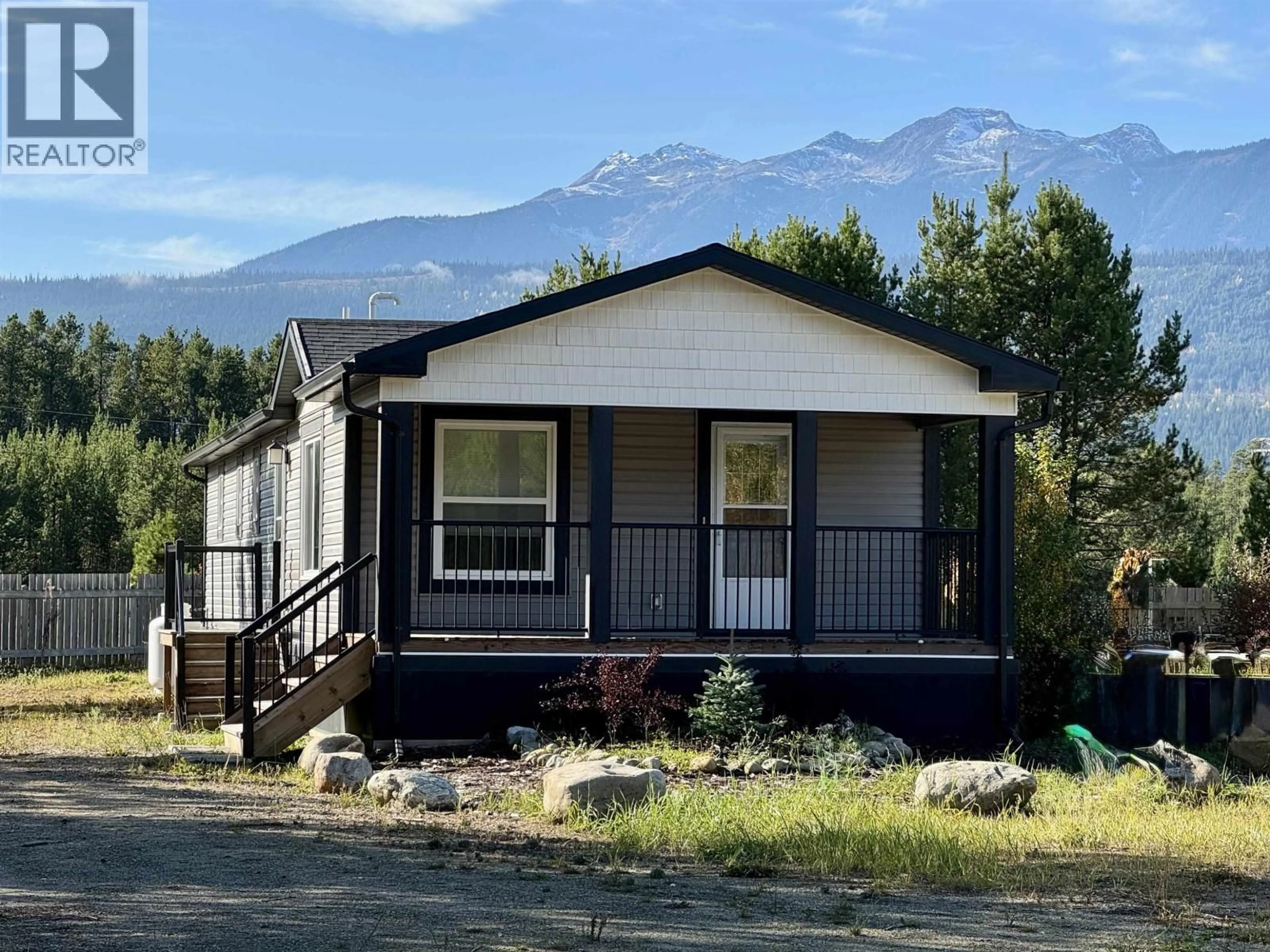Home with vinyl exterior material, mountain view for 1471 8TH PLACE, Valemount British Columbia V0E2Z0
