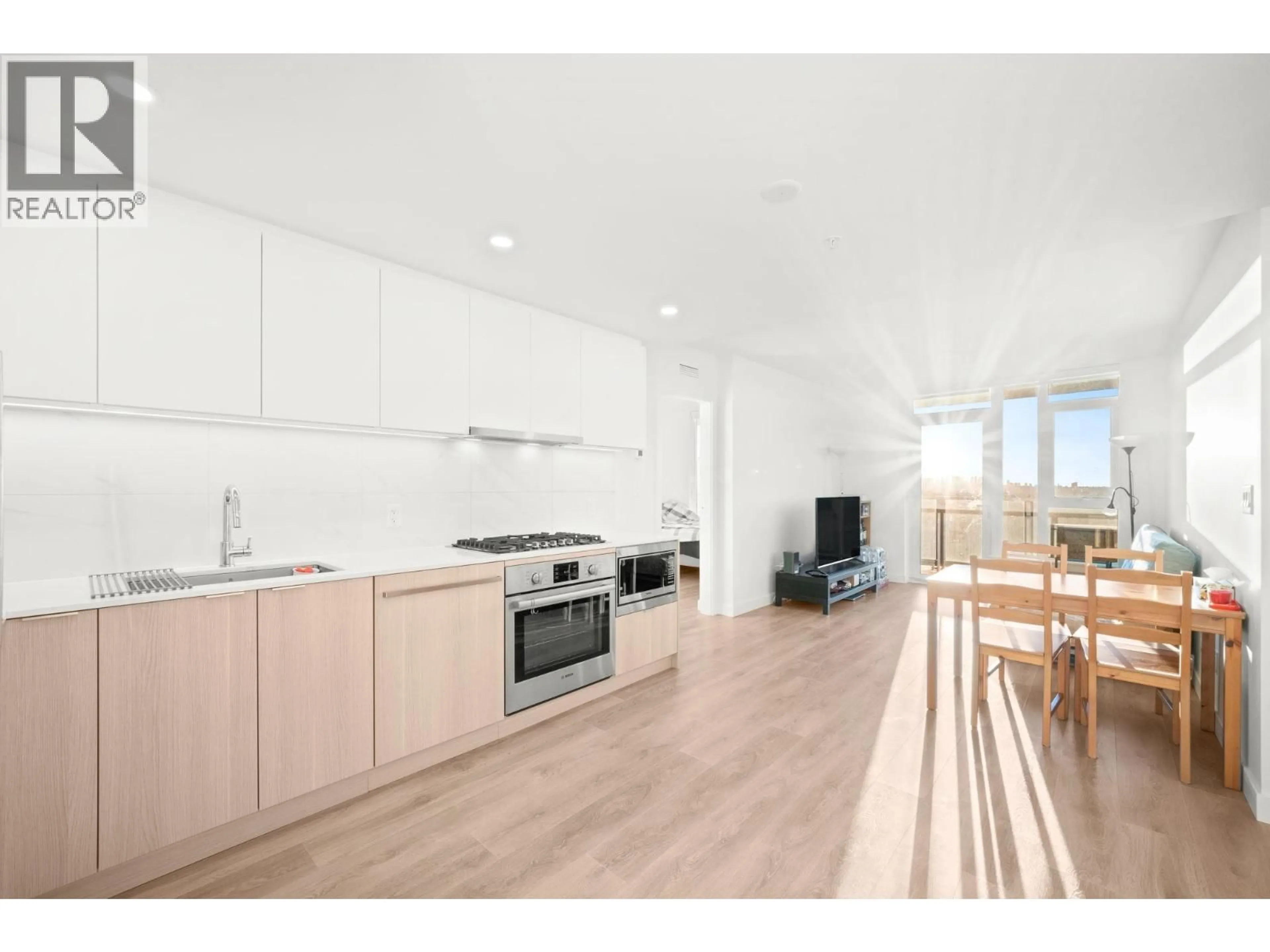 Open concept kitchen, wood/laminate floor for 2508 - 318 ALDERSON AVENUE, Coquitlam British Columbia V3K0J1
