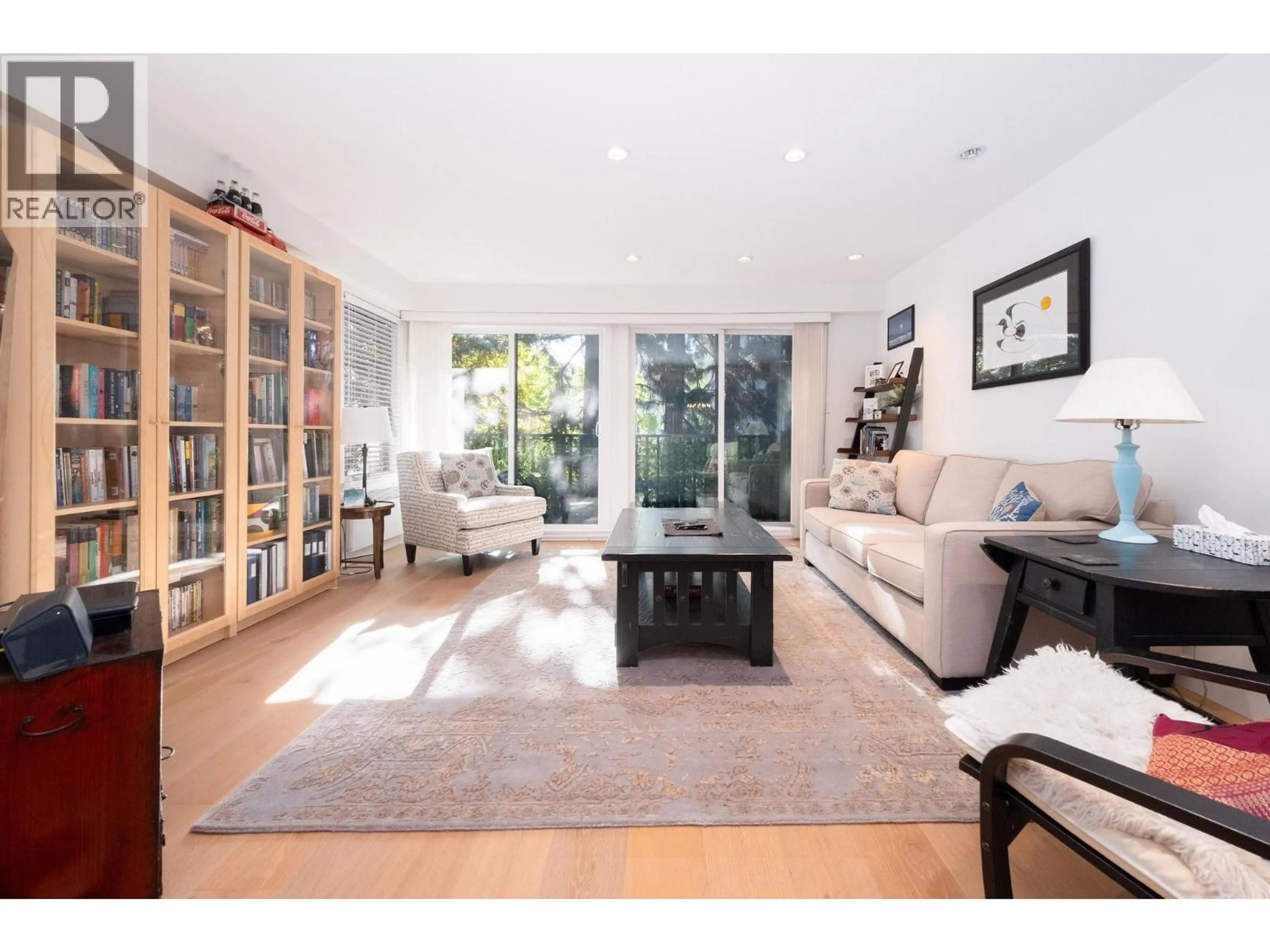 Living room with furniture, wood/laminate floor for 311 - 1274 BARCLAY STREET, Vancouver British Columbia V6E1H3