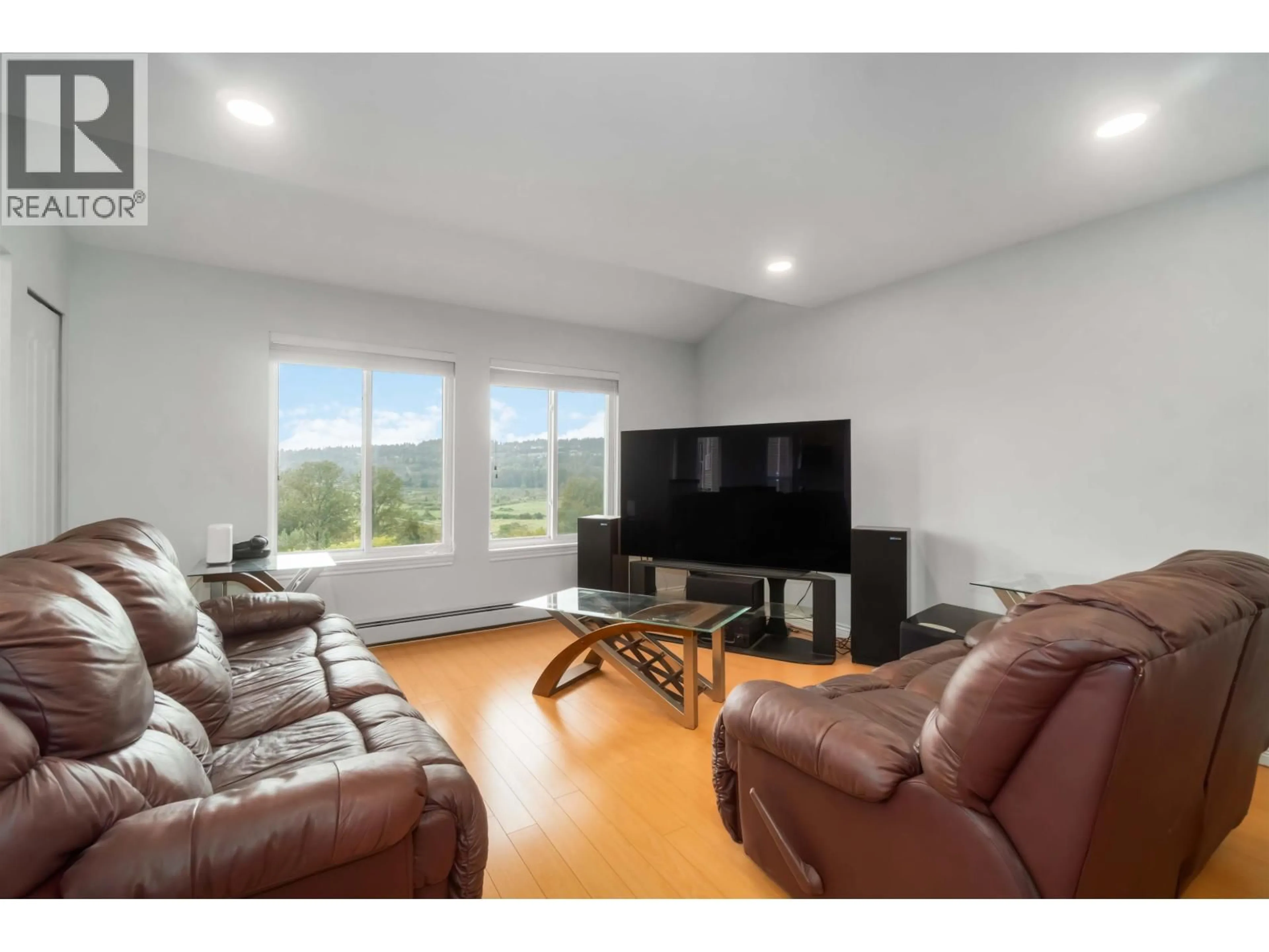 Living room with furniture, wood/laminate floor for 1159 BENNET DRIVE, Port Coquitlam British Columbia V3C6H2