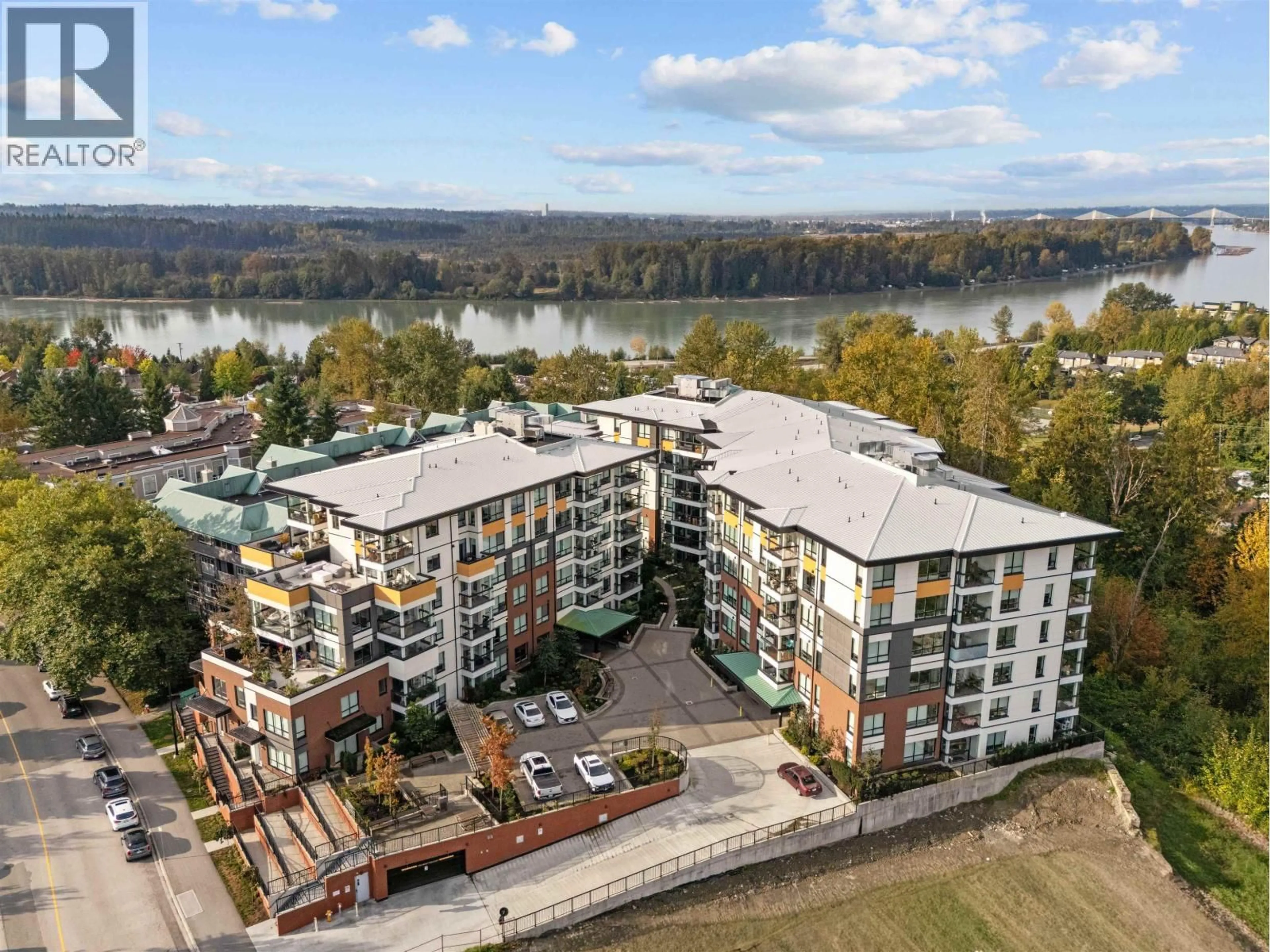 A pic from outside/outdoor area/front of a property/back of a property/a pic from drone, water/lake/river/ocean view for 406 - 11639 227 STREET, Maple Ridge British Columbia V2X9B2