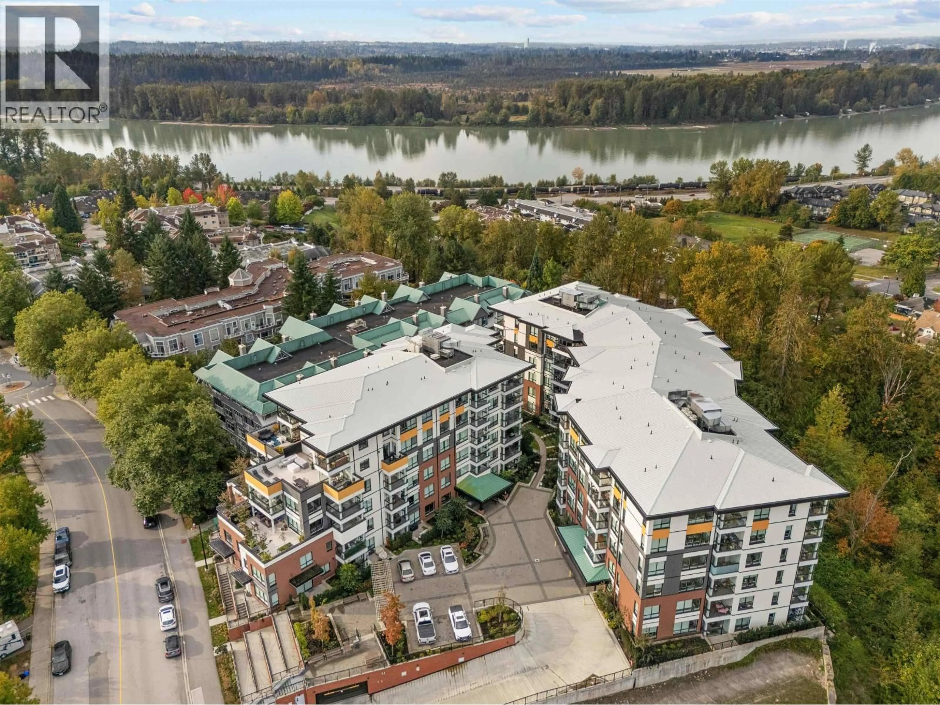 A pic from outside/outdoor area/front of a property/back of a property/a pic from drone, water/lake/river/ocean view for 406 - 11639 227 STREET, Maple Ridge British Columbia V2X9B2