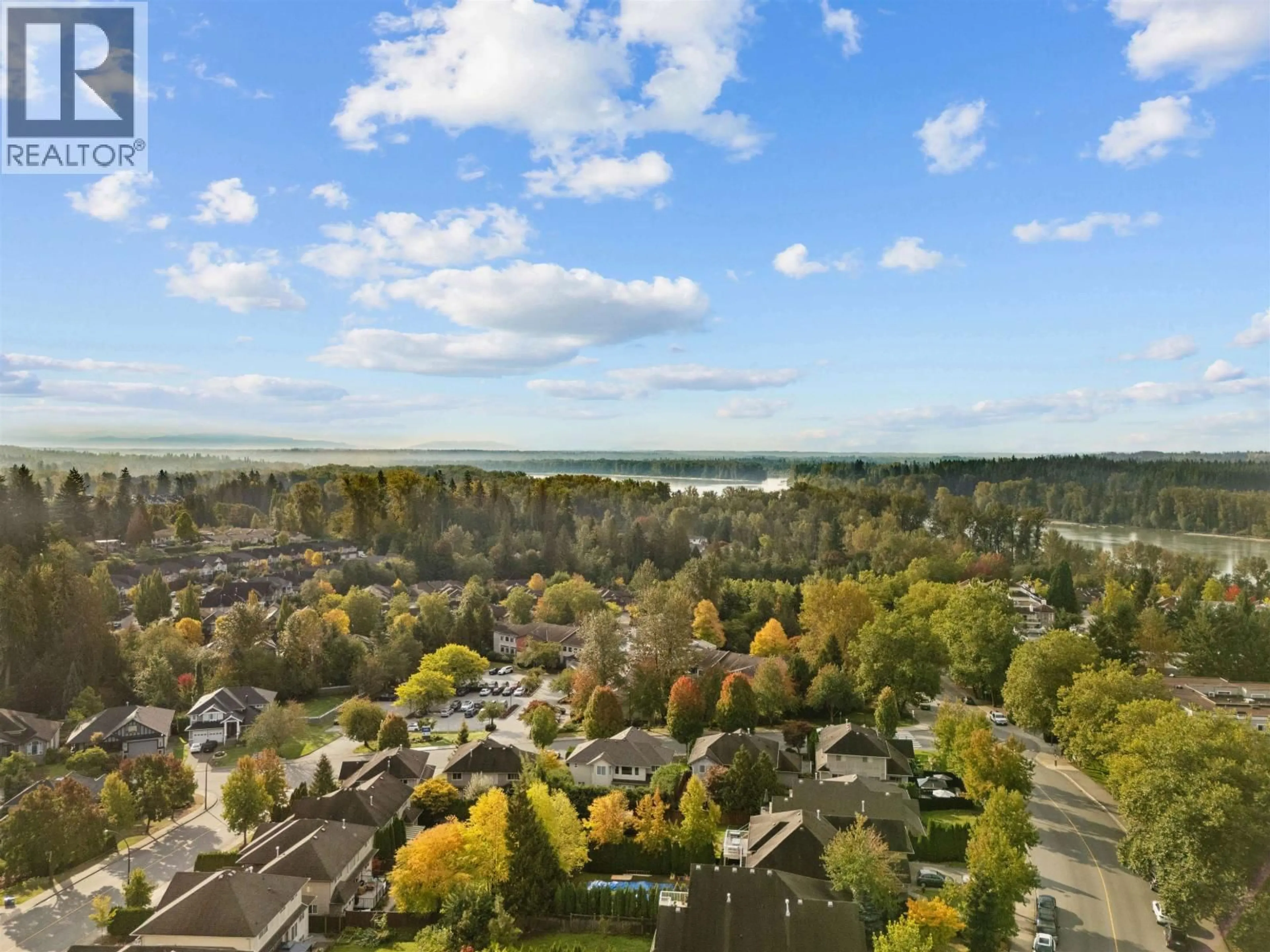 A pic from outside/outdoor area/front of a property/back of a property/a pic from drone, water/lake/river/ocean view for 406 - 11639 227 STREET, Maple Ridge British Columbia V2X9B2